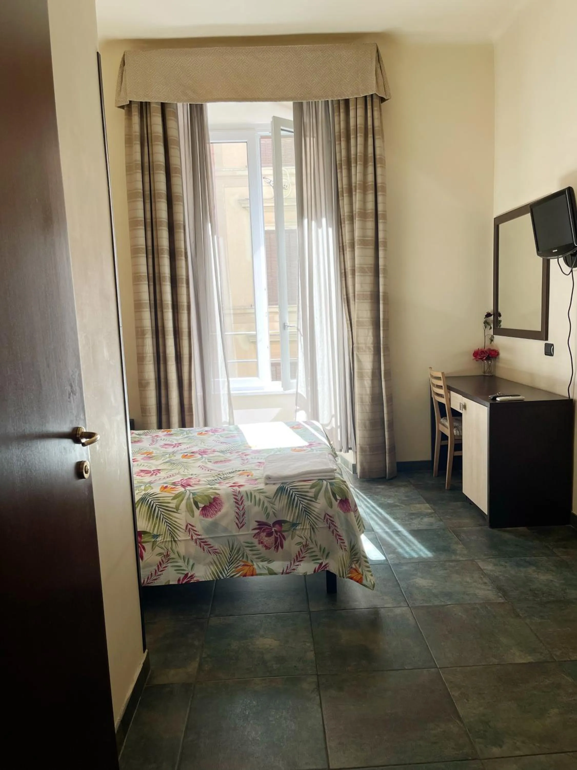 Photo of the whole room, Bed in Clarian Affittacamere