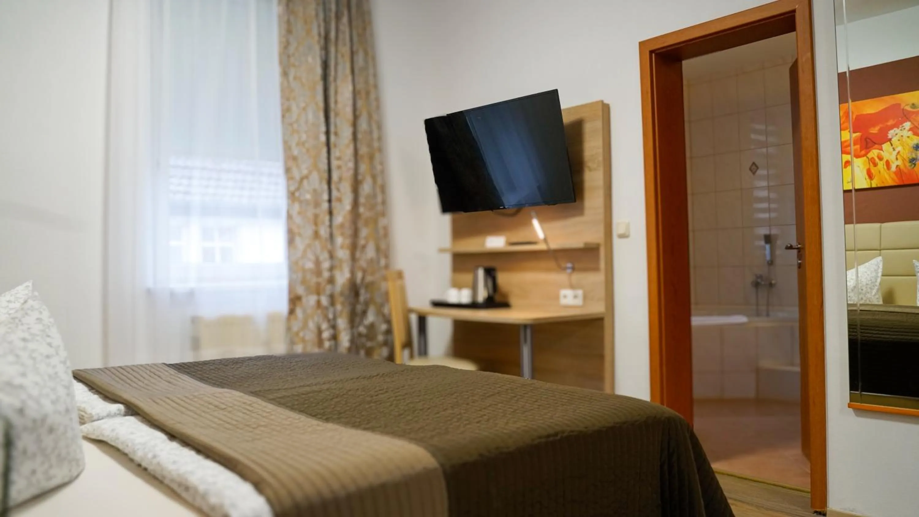 Bed in Hotel Maximilian