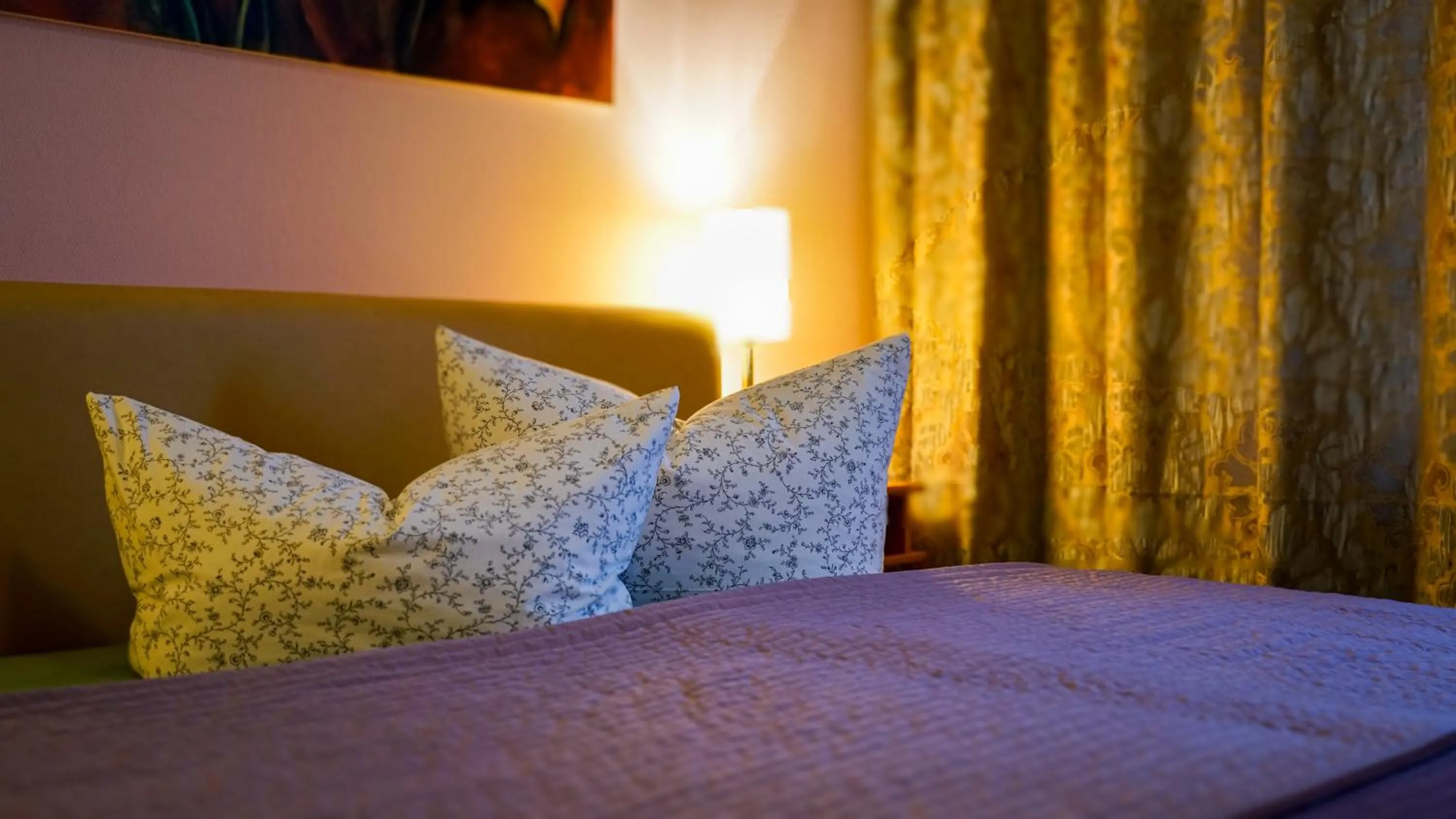 Bed in Hotel Maximilian