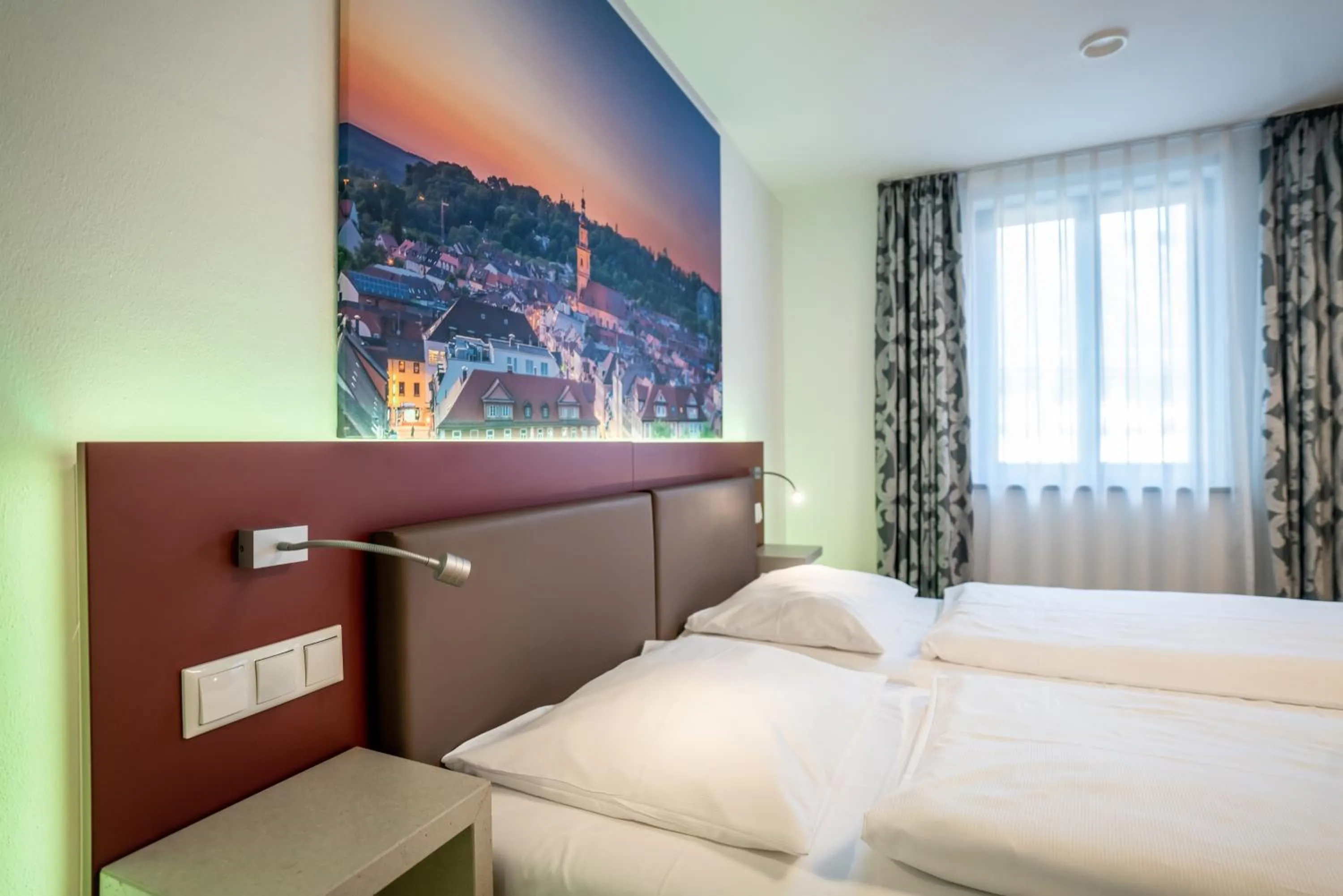 Bed in Altstadthotel Grauer Wolf