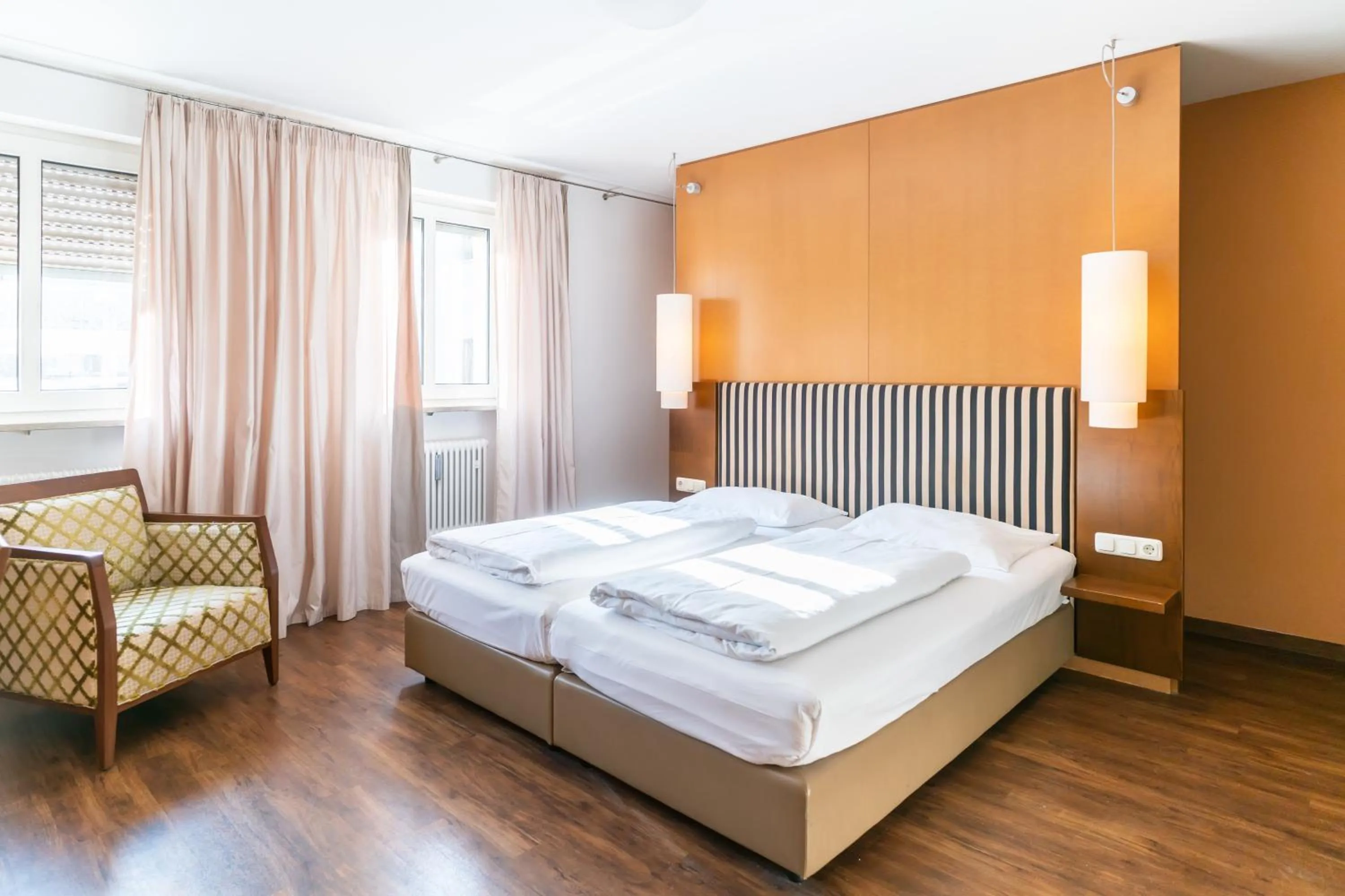 Photo of the whole room, Bed in Altstadthotel Grauer Wolf