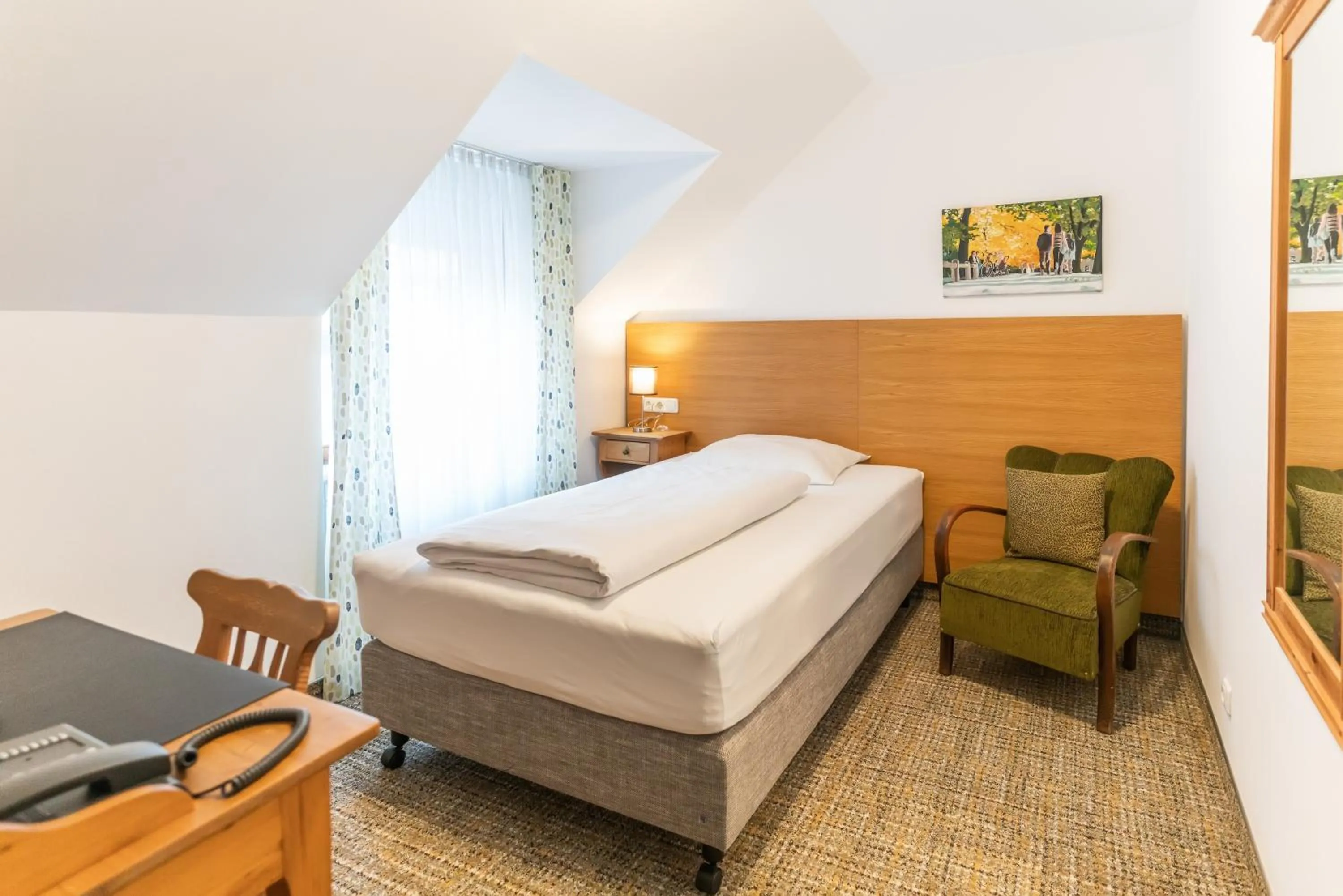 Photo of the whole room, Bed in Altstadthotel Grauer Wolf