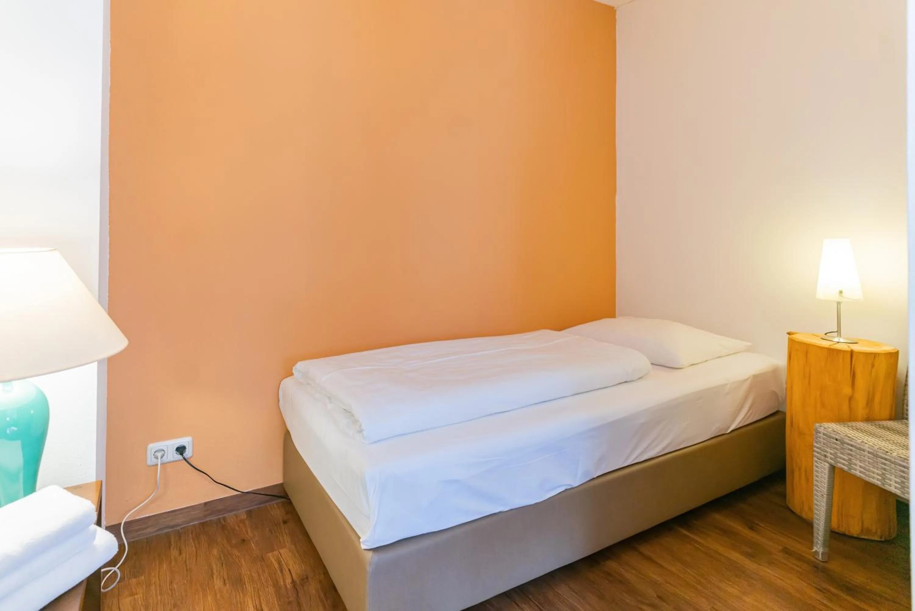 Bed in Altstadthotel Grauer Wolf