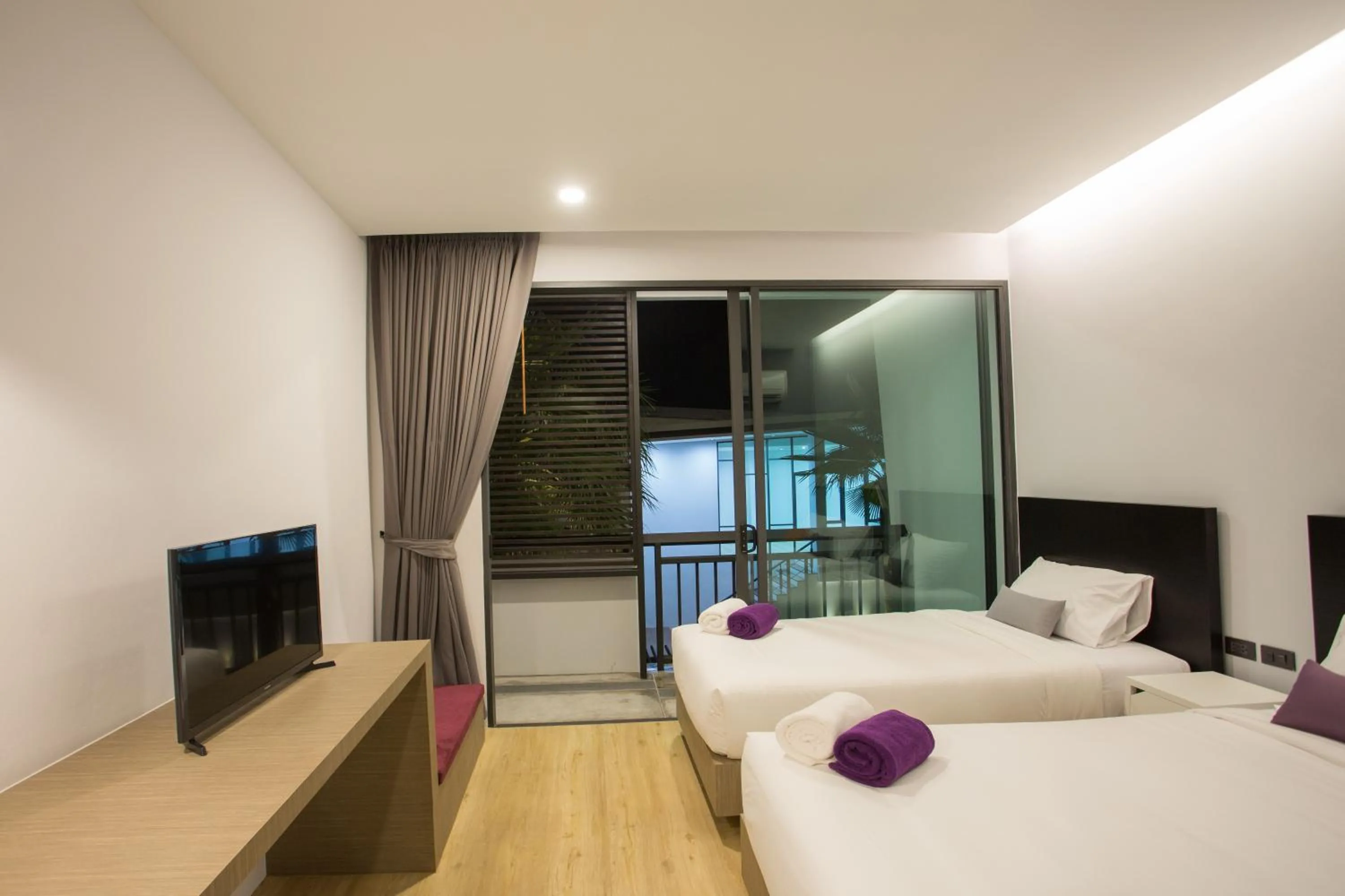 Bed in Chaweng Villawee Hotel