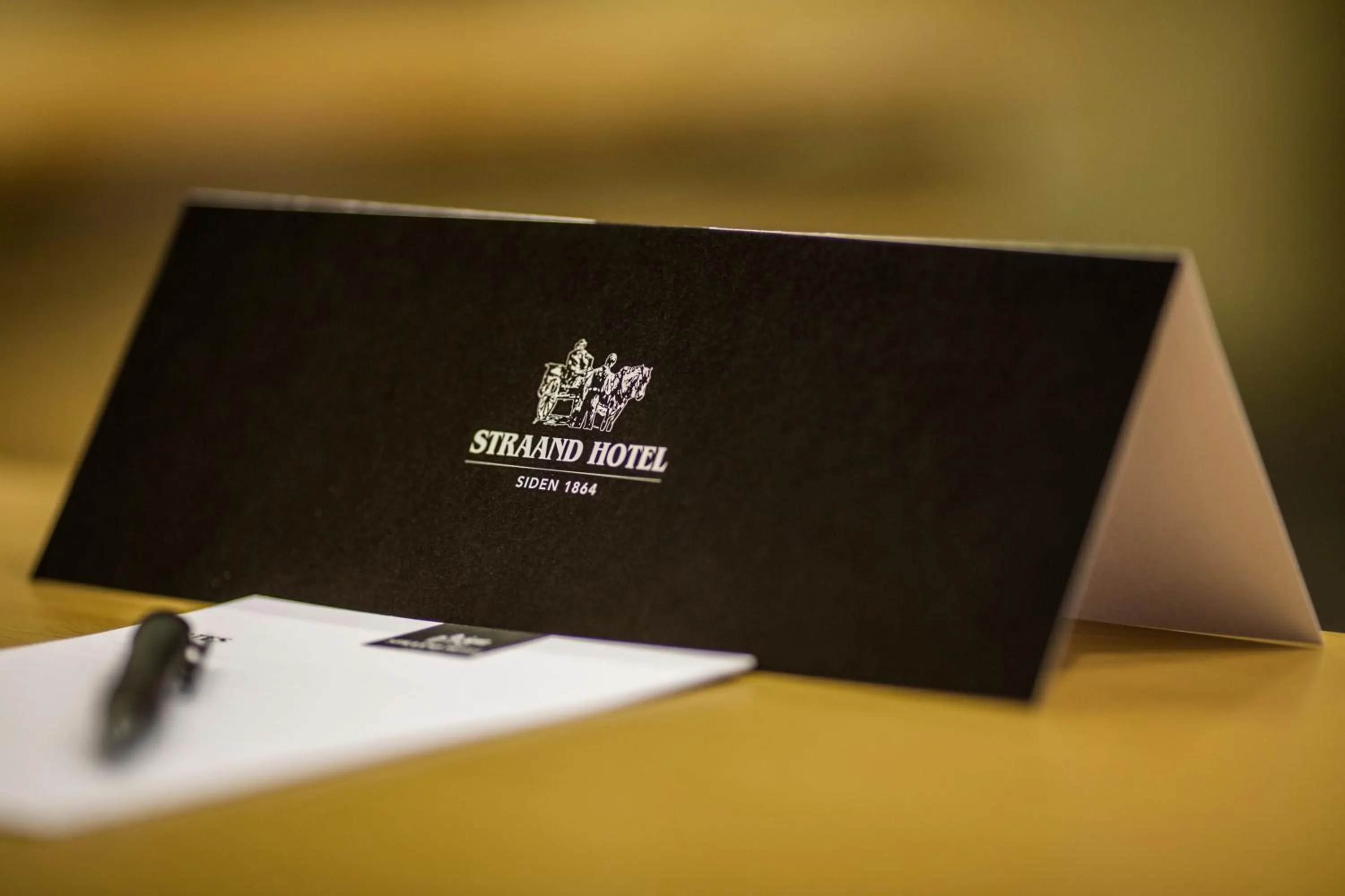 Property logo or sign in Straand Hotel