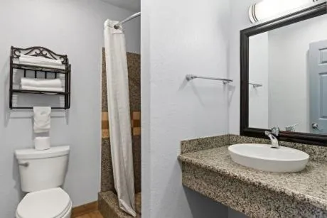 Toilet in Bay Breeze Inn