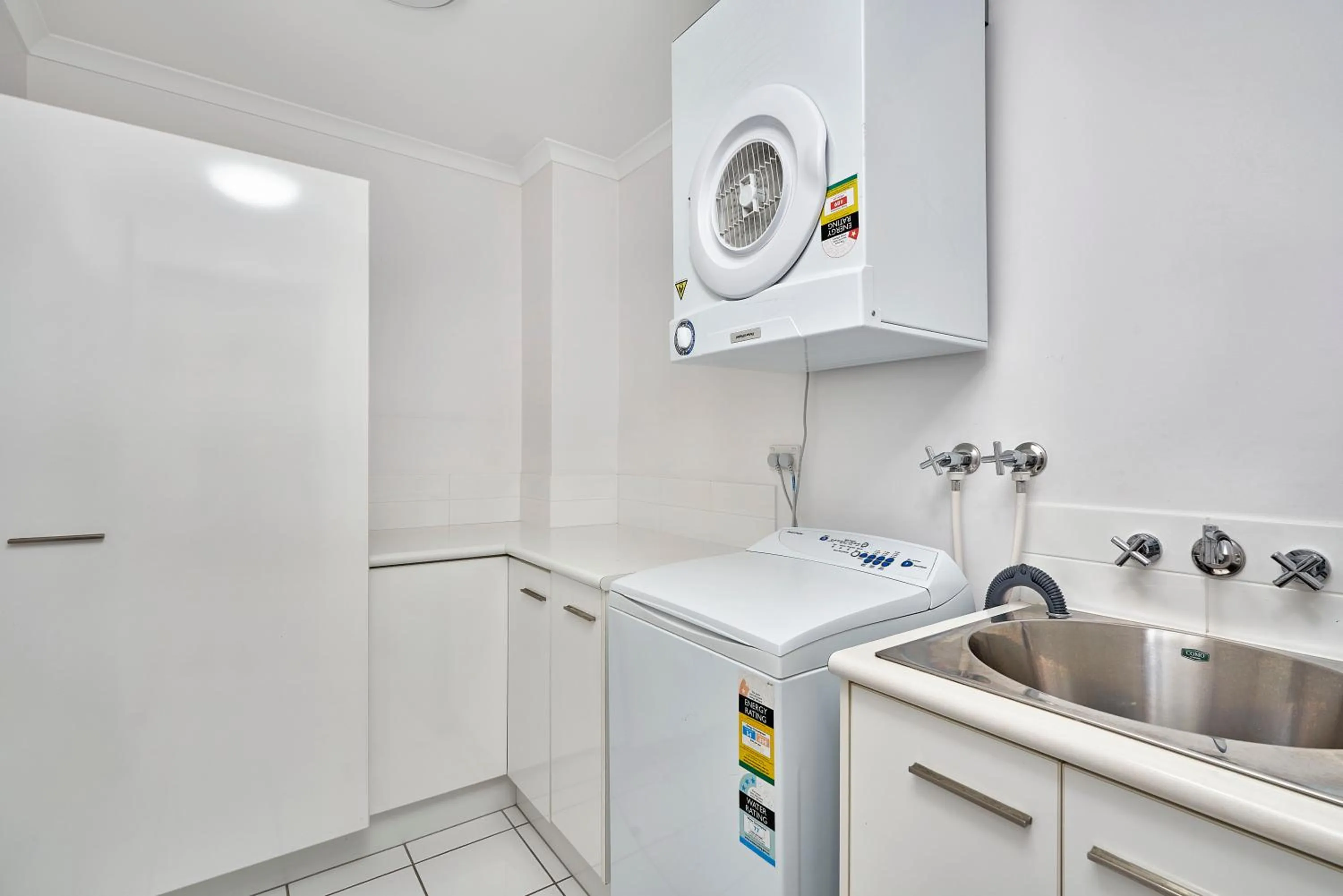 washing machine in Vision Apartments