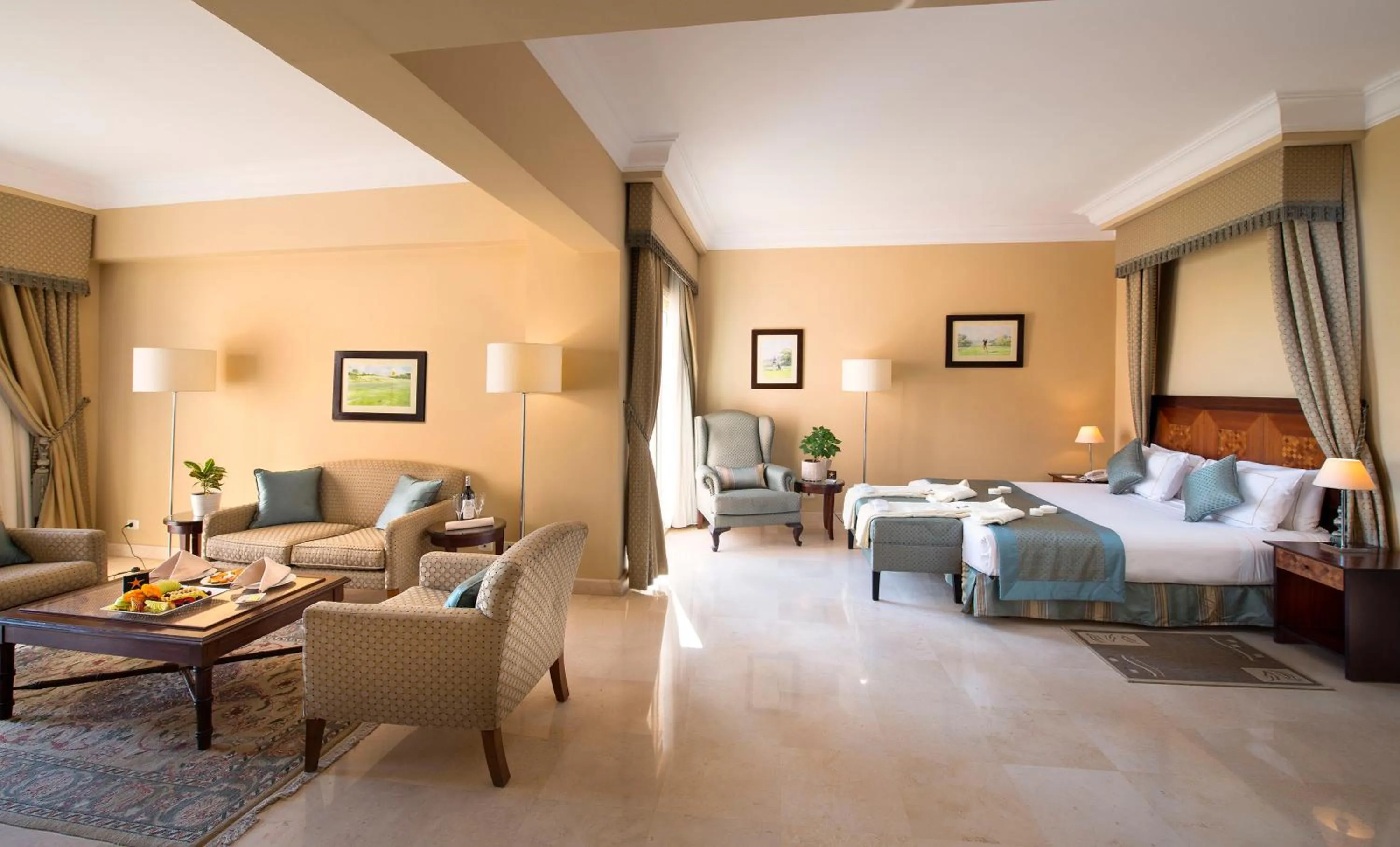 Seating area, Bed in Stella Golf Hotel