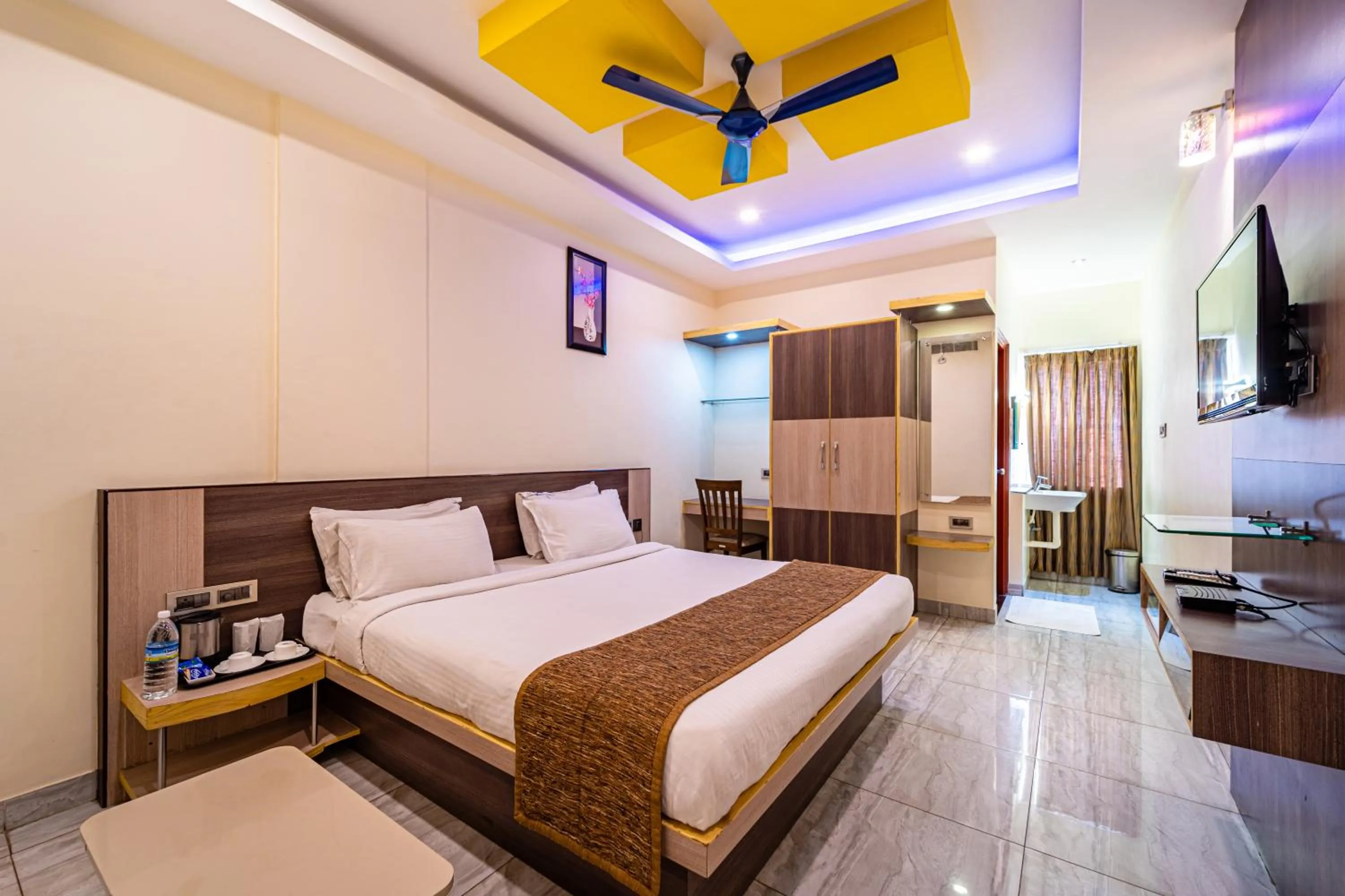 Photo of the whole room, Bed in Thaneegai Residency