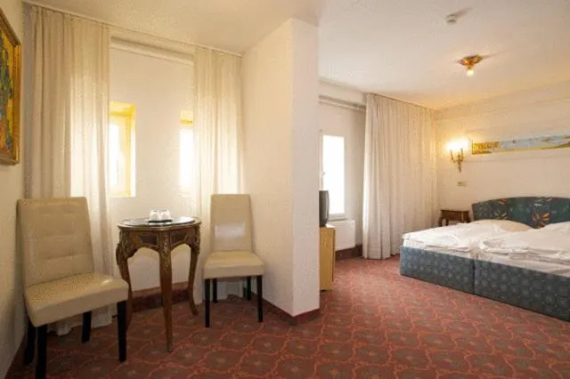 Photo of the whole room, Bed in Hotel Behrmann