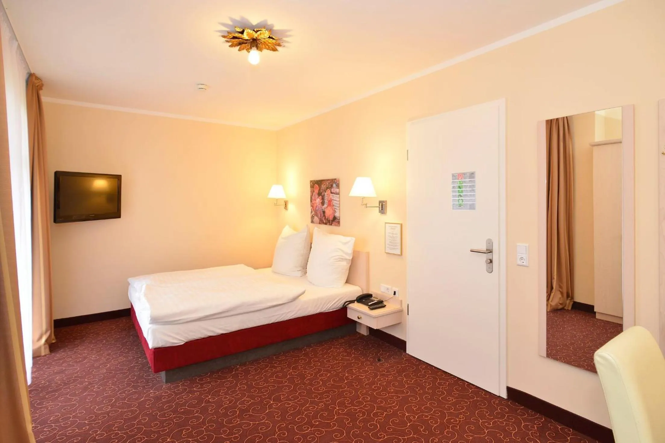 Photo of the whole room, Bed in Hotel Behrmann