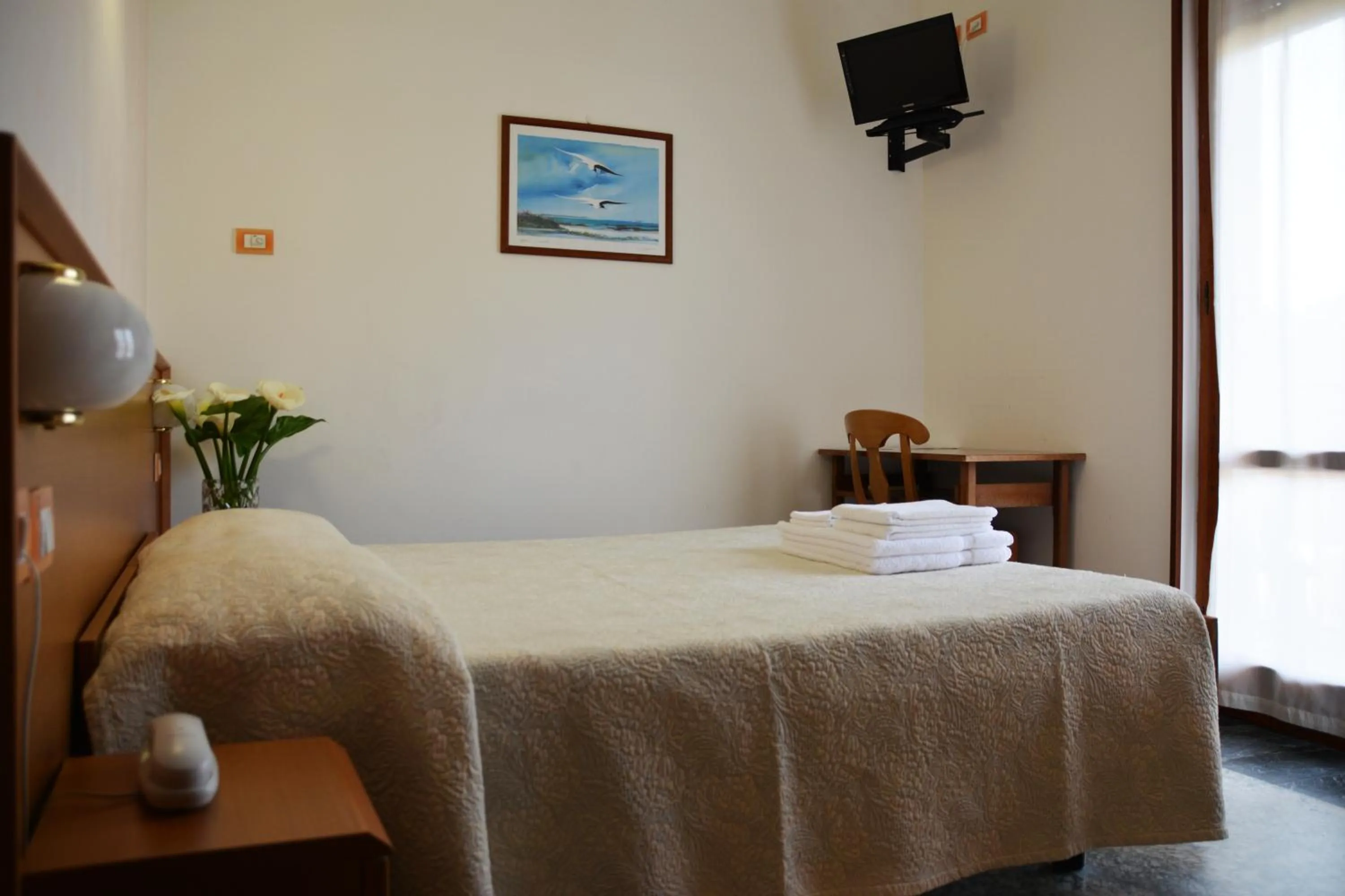 Bed in Hotel Corallo