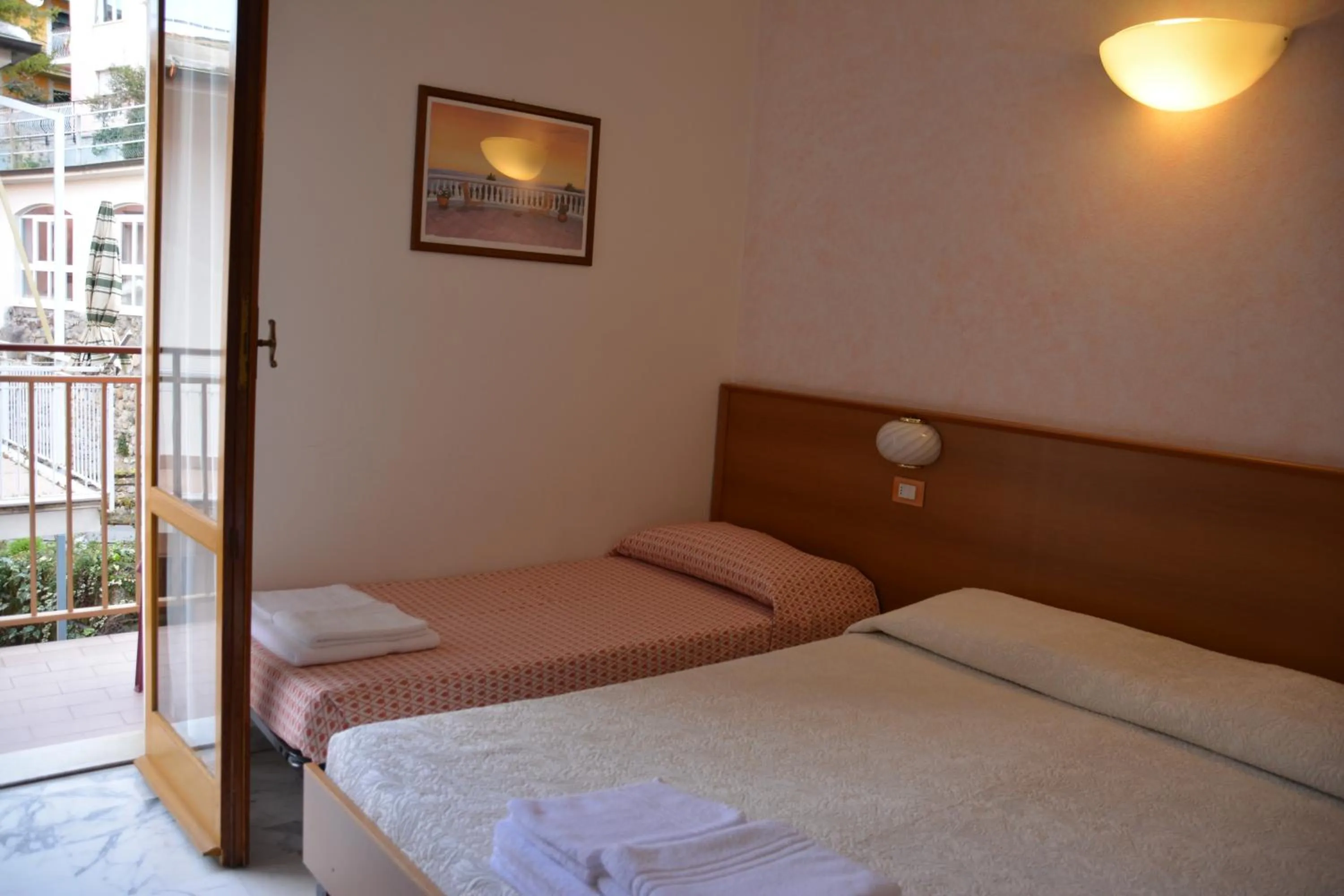 Bed in Hotel Corallo