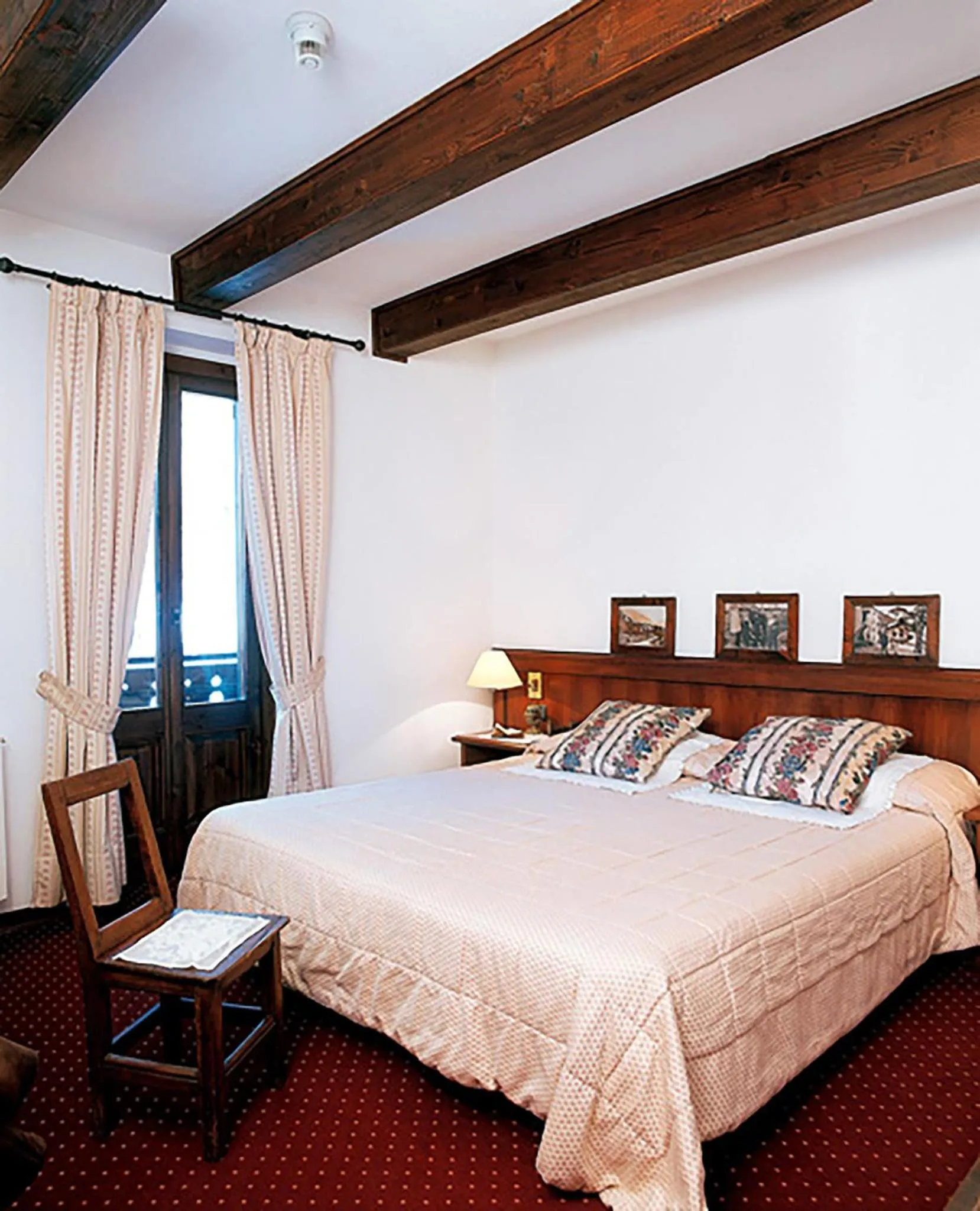 Bed in Hotel Dei Camosci