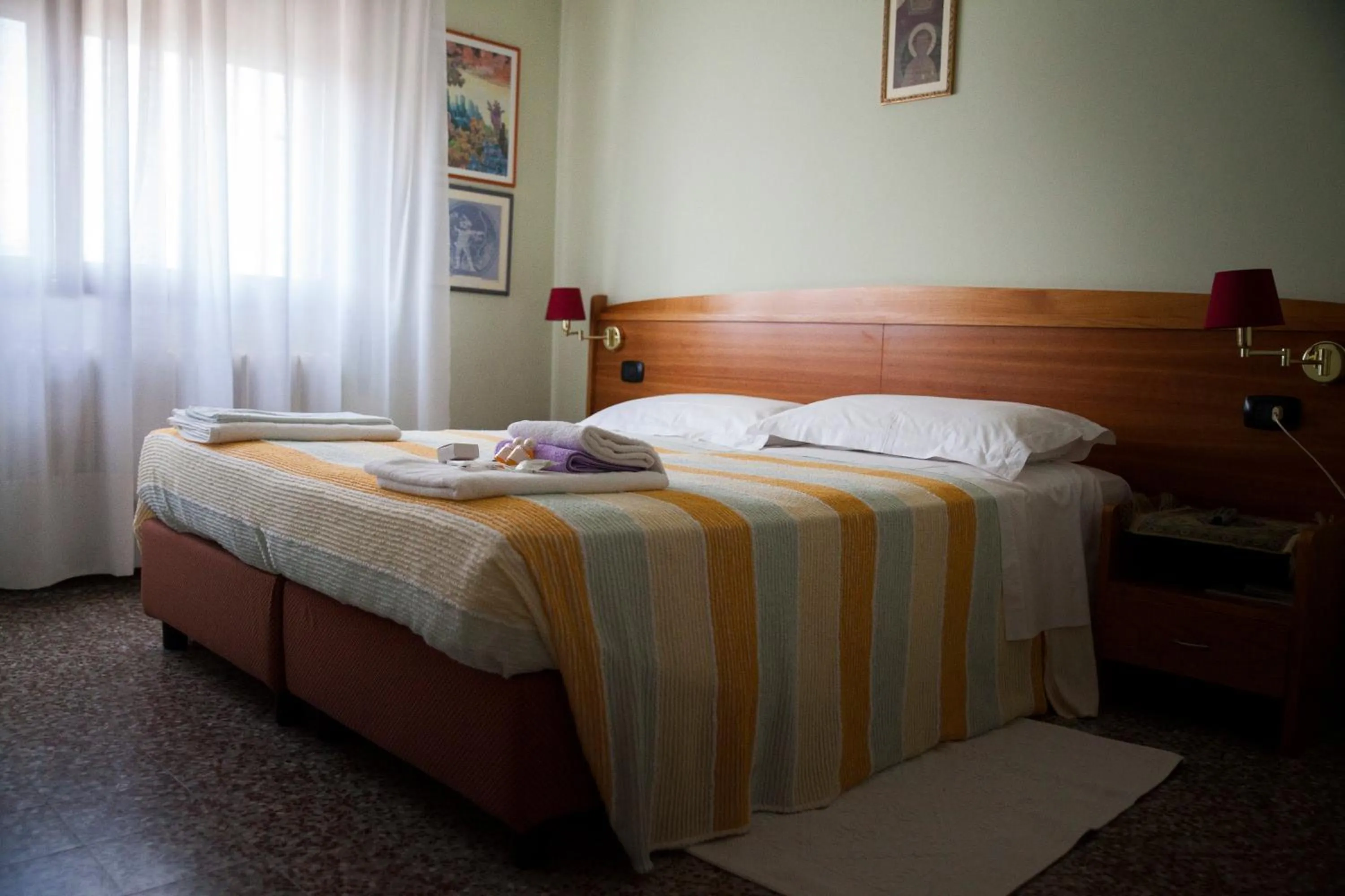 Bed in Hotel Trieste