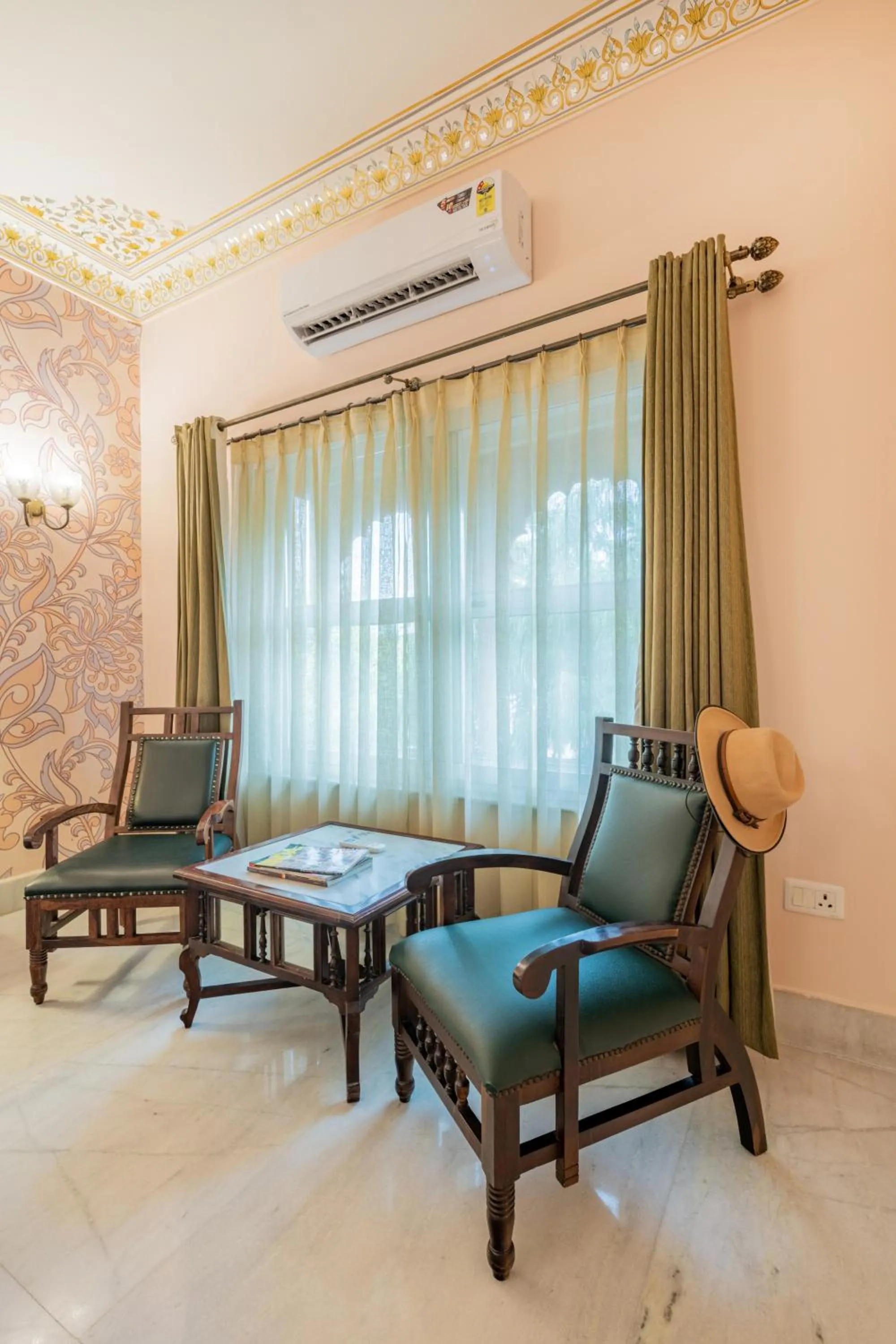 Seating area in Suryaa Villa - A Boutique Heritage Hotel