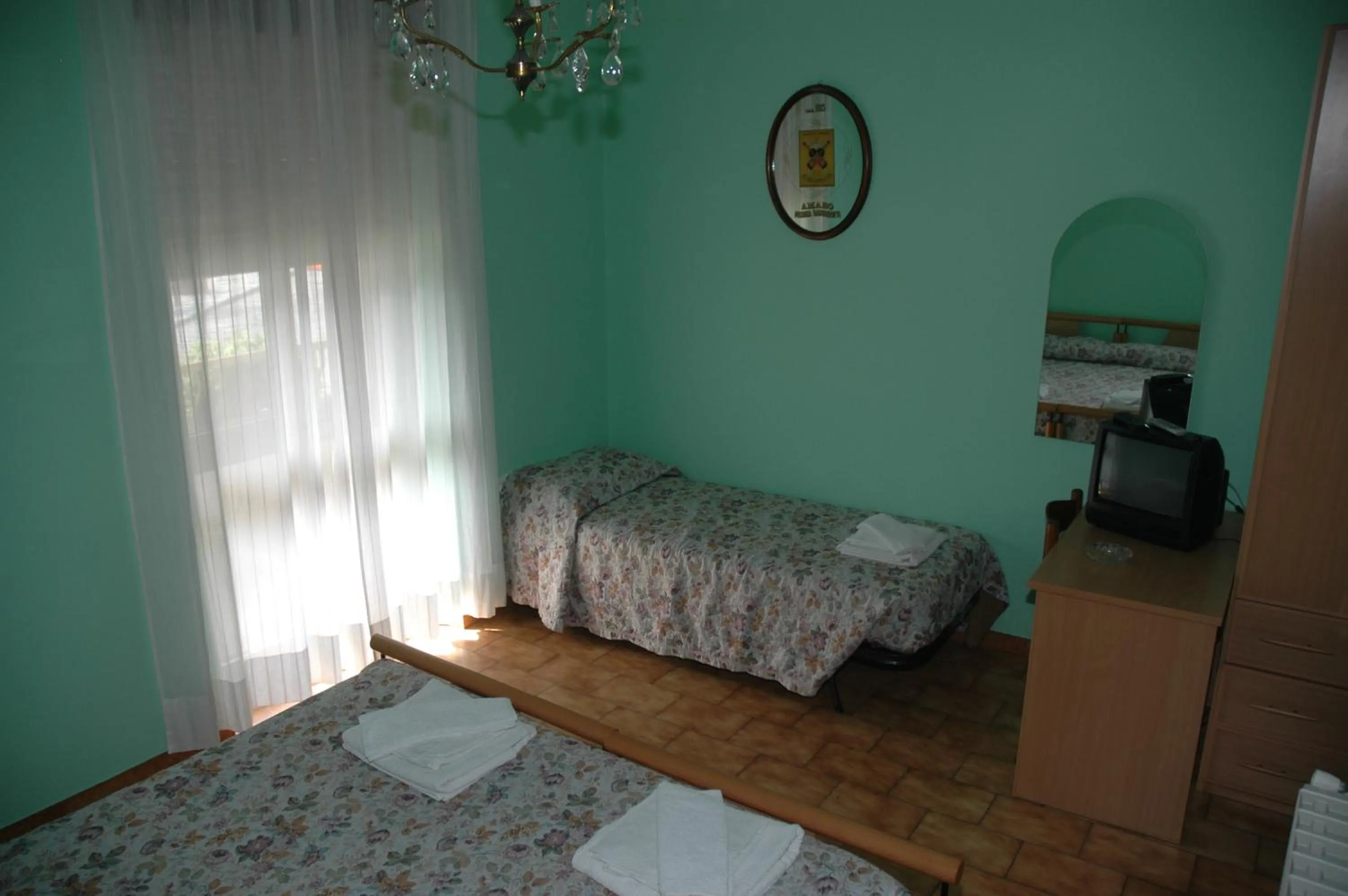 Bed in Hotel Valentino