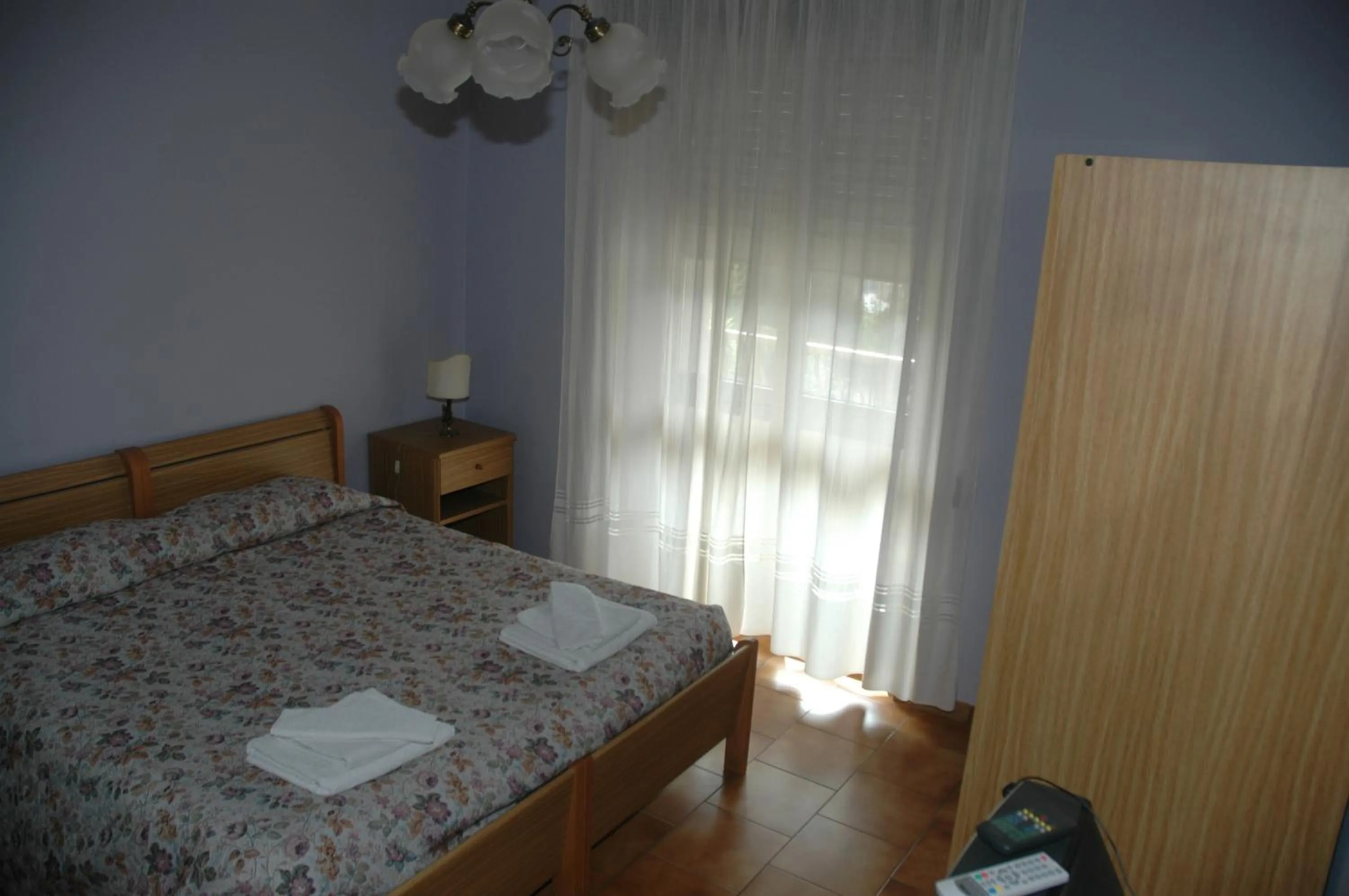 Bed in Hotel Valentino