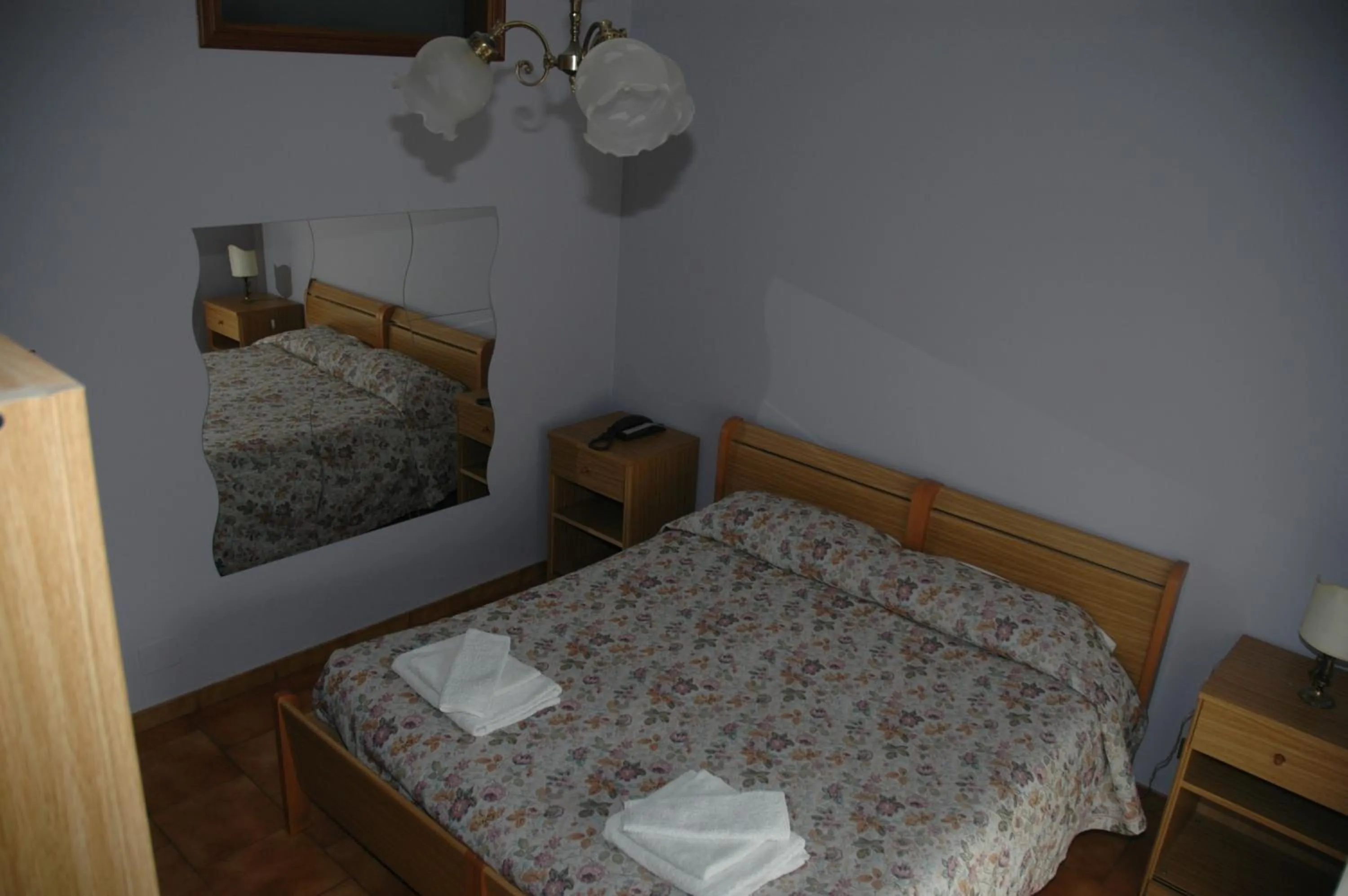 Bed in Hotel Valentino