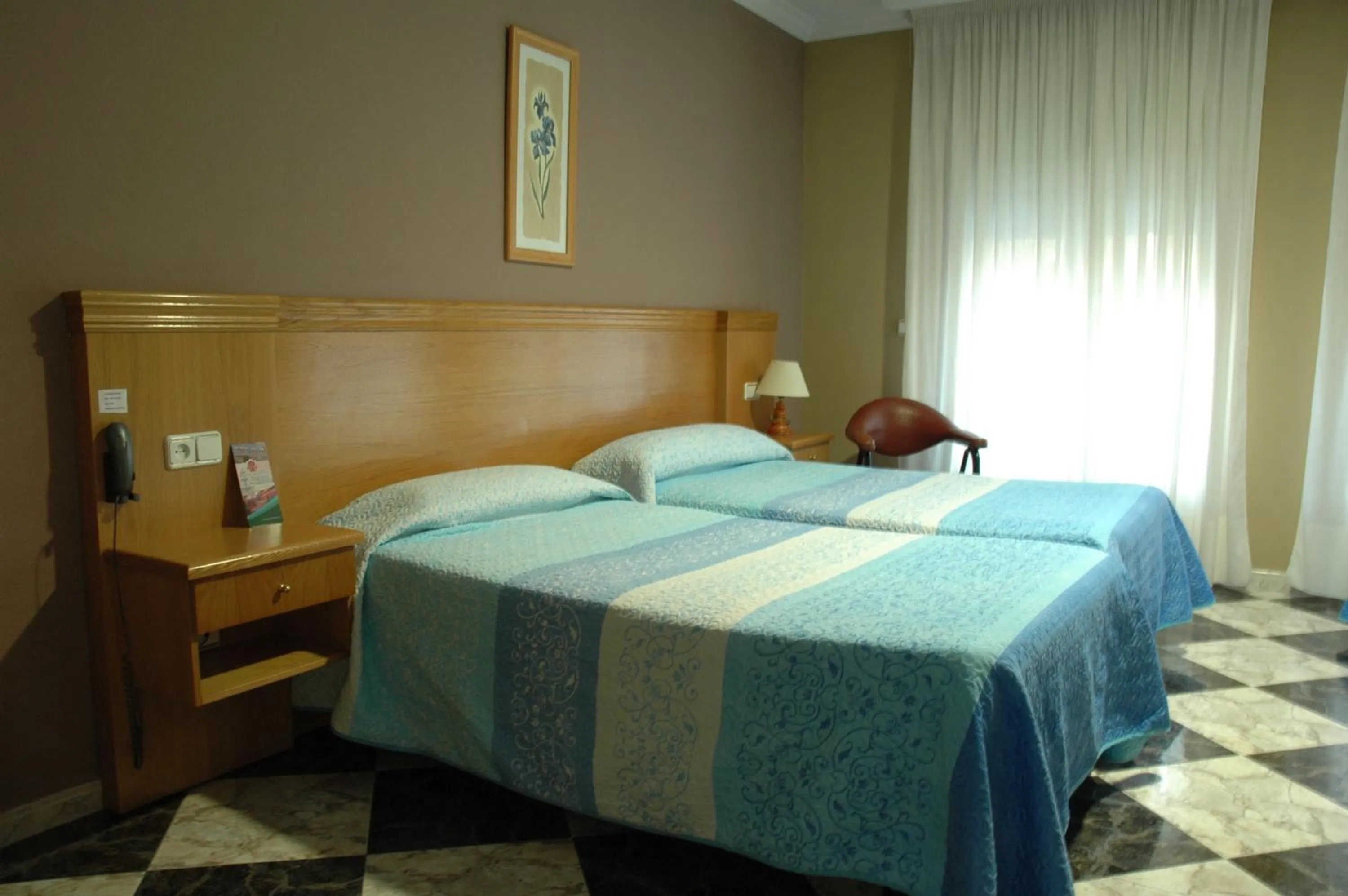 Decorative detail, Bed in Hotel Plaza Manjón