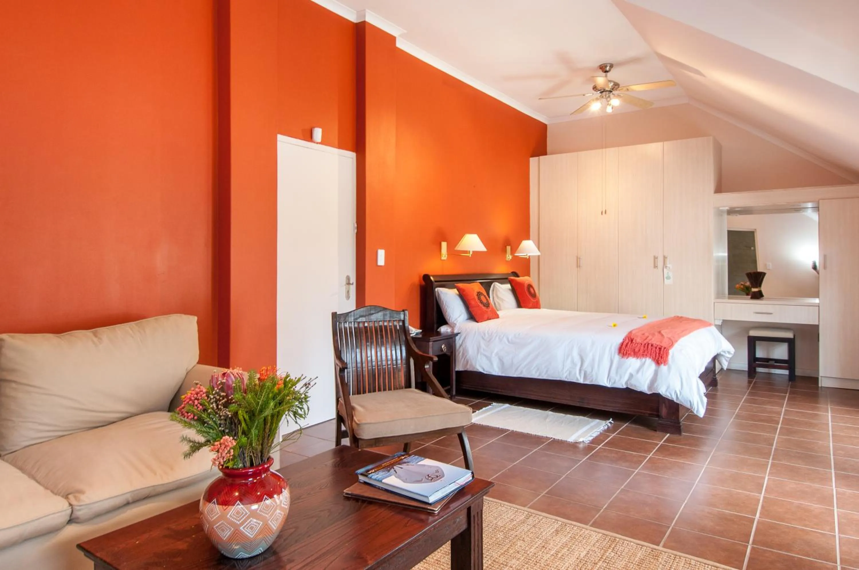 Seating area, Bed in Wind-Rose Guest House