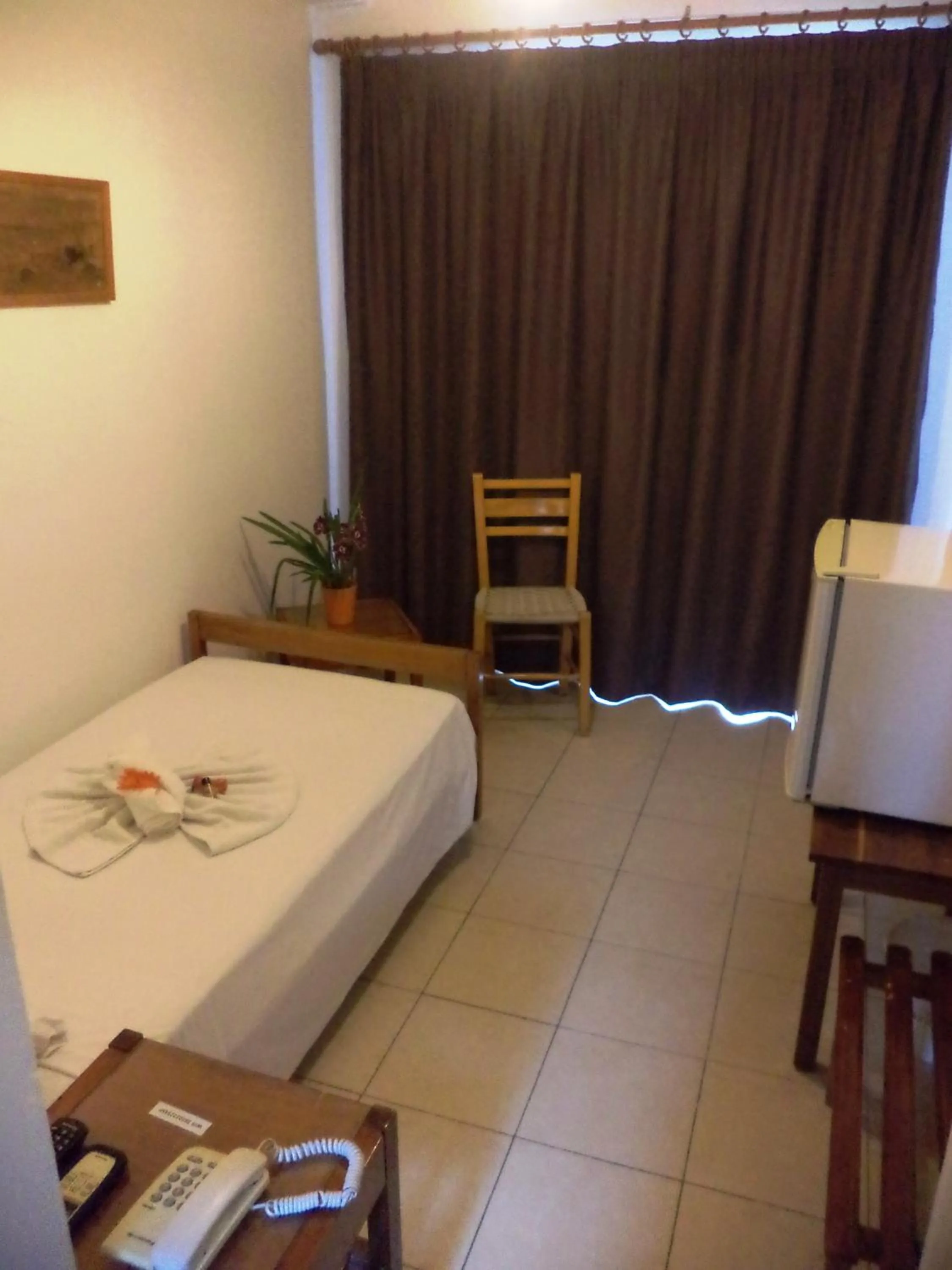 Bed in Poseidon Hotel