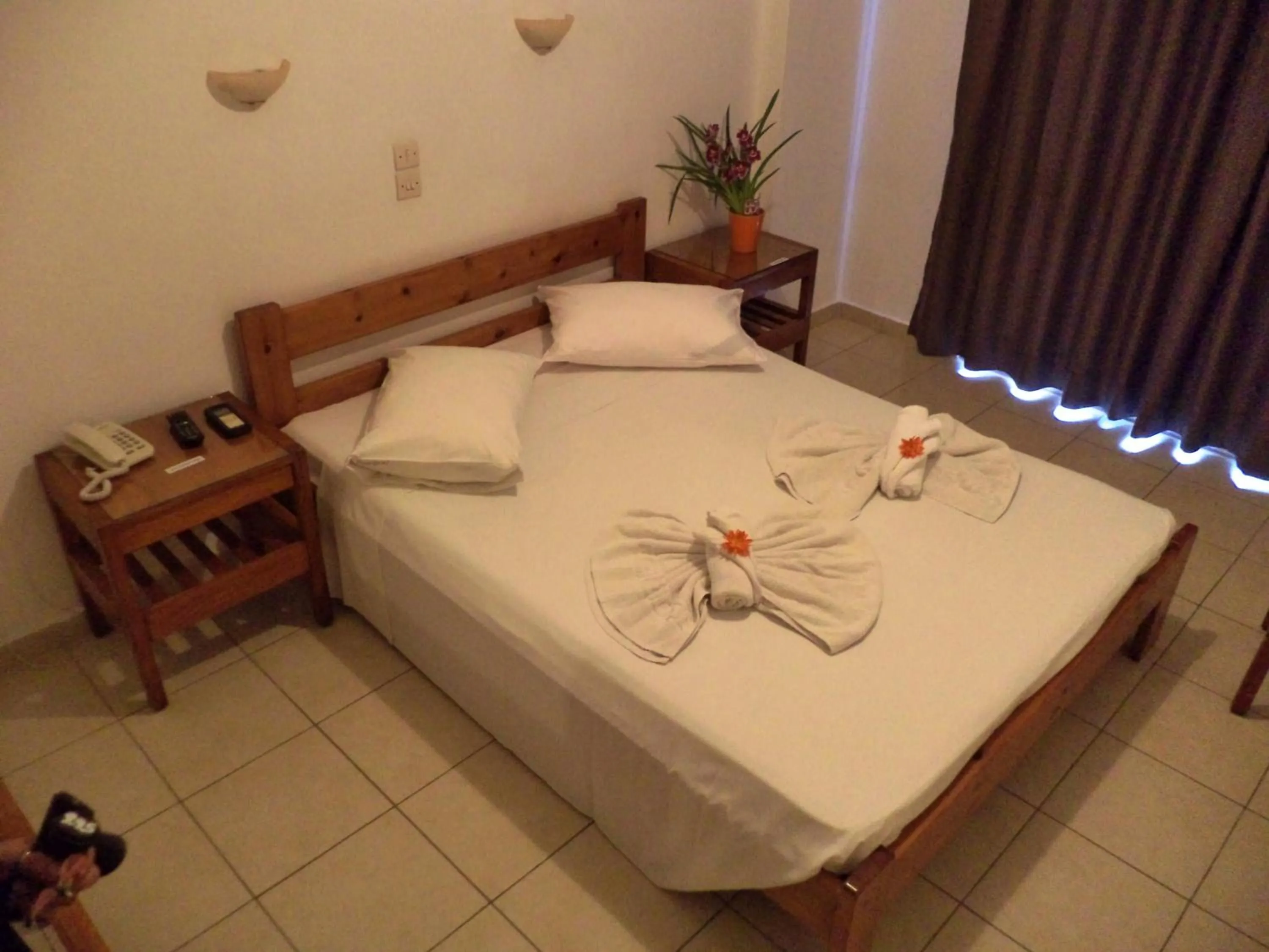 Bed in Poseidon Hotel