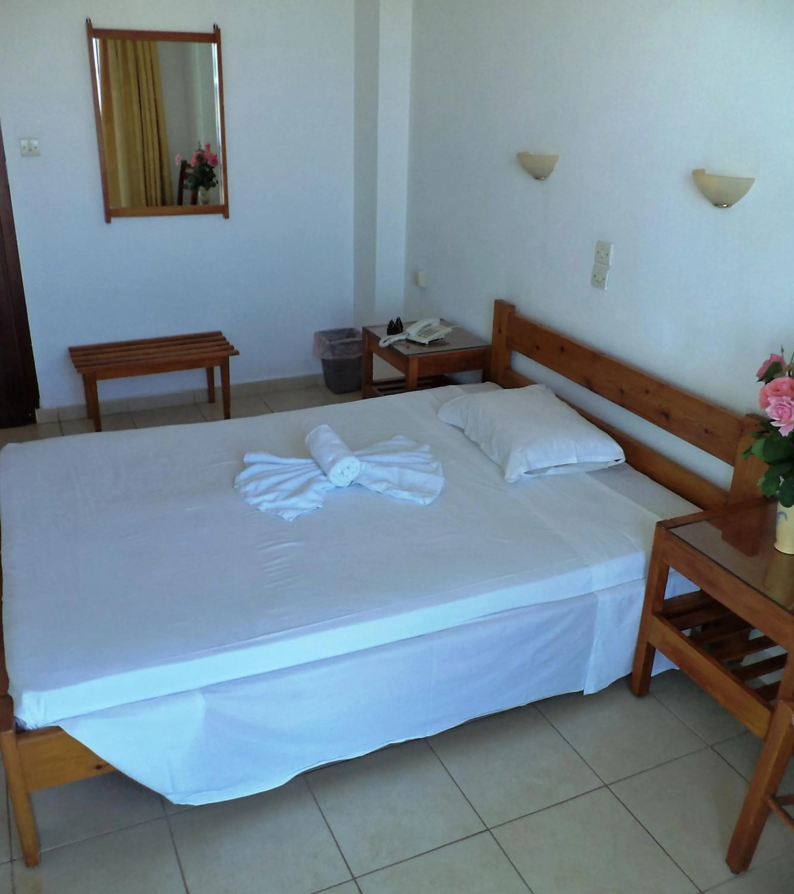 Bed in Poseidon Hotel