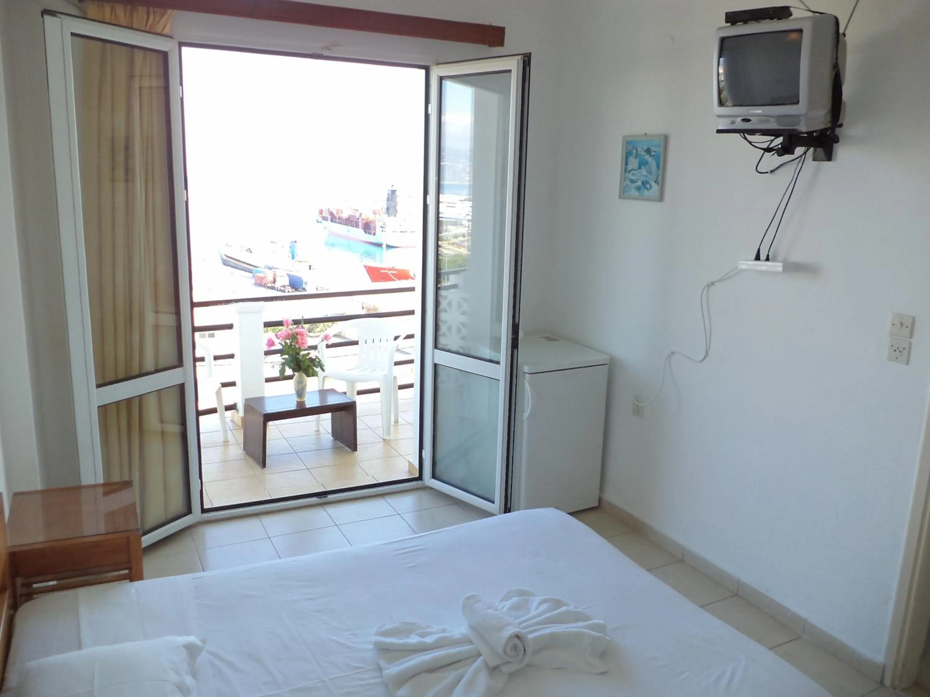 Bed in Poseidon Hotel