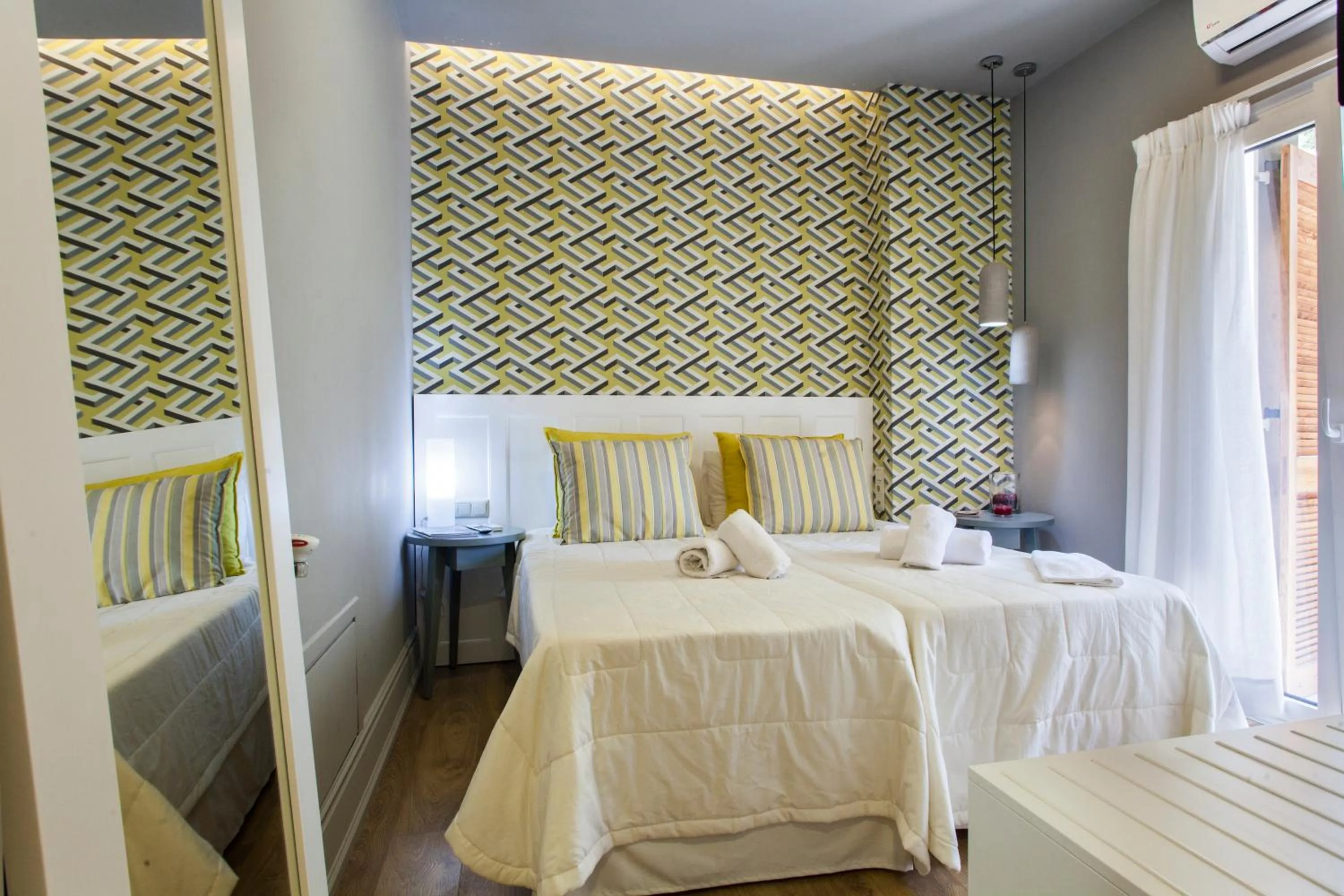 Bed in Candia Studios & Rooms