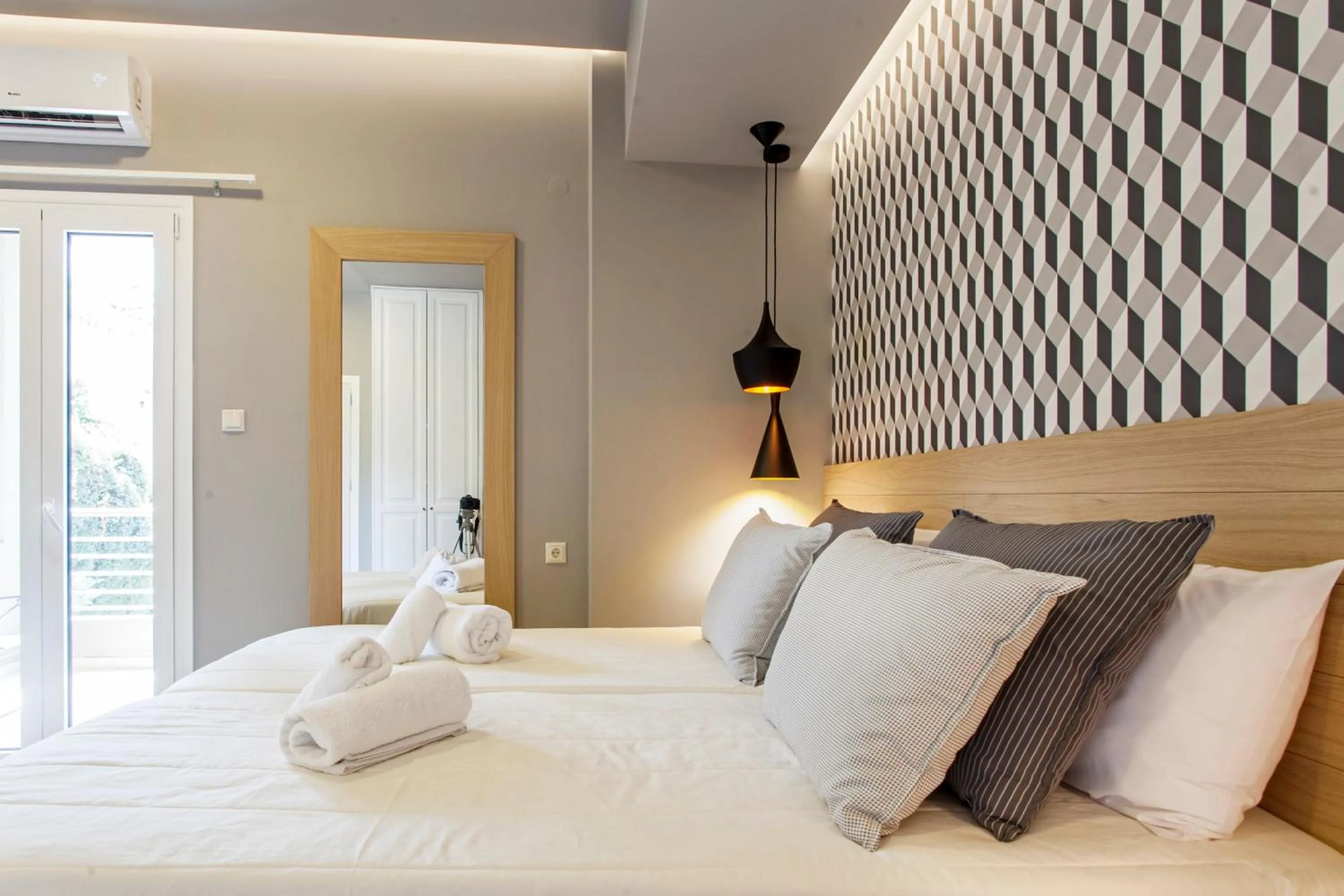 Bed in Candia Studios & Rooms