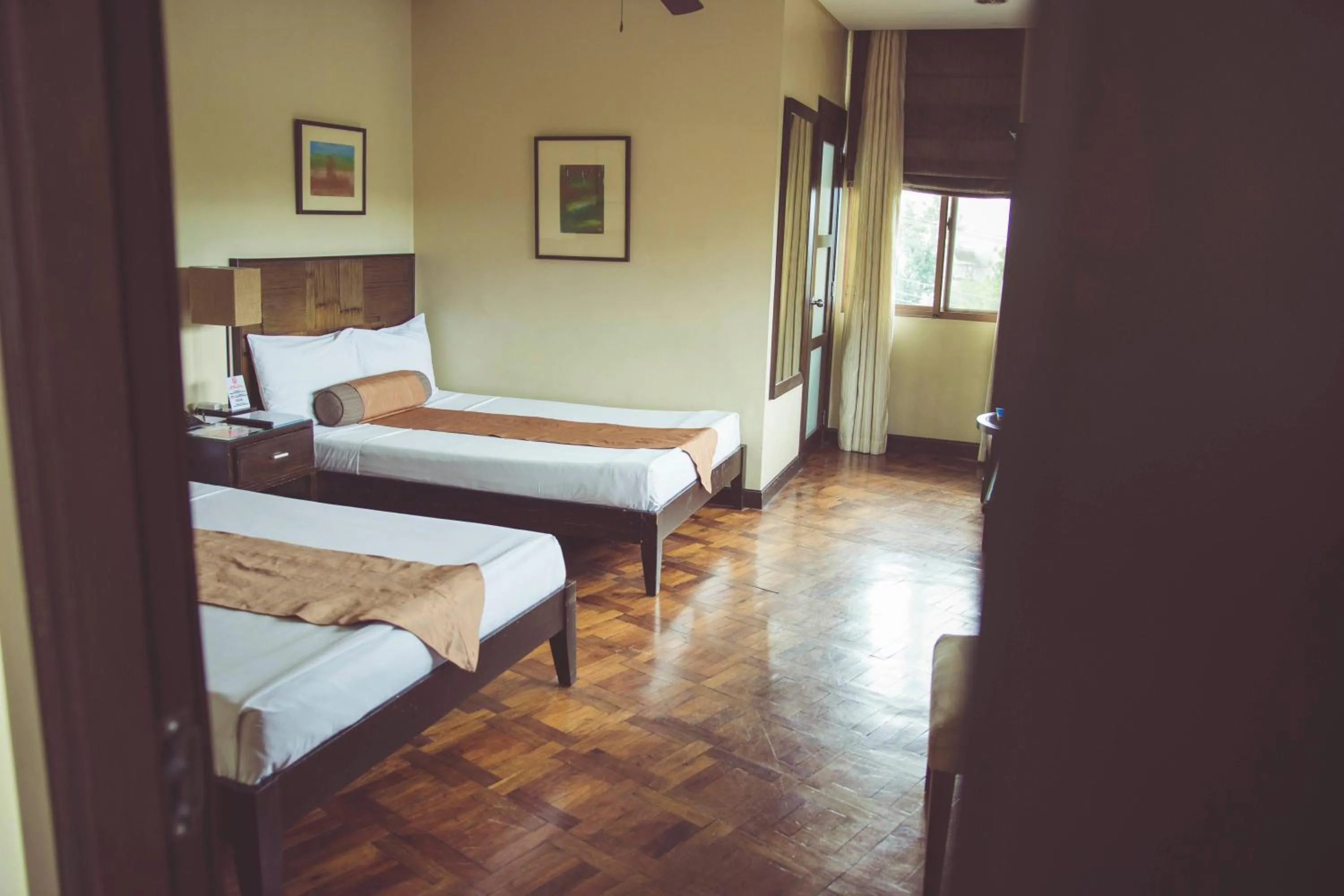 Bed in El Cielito Hotel - Baguio