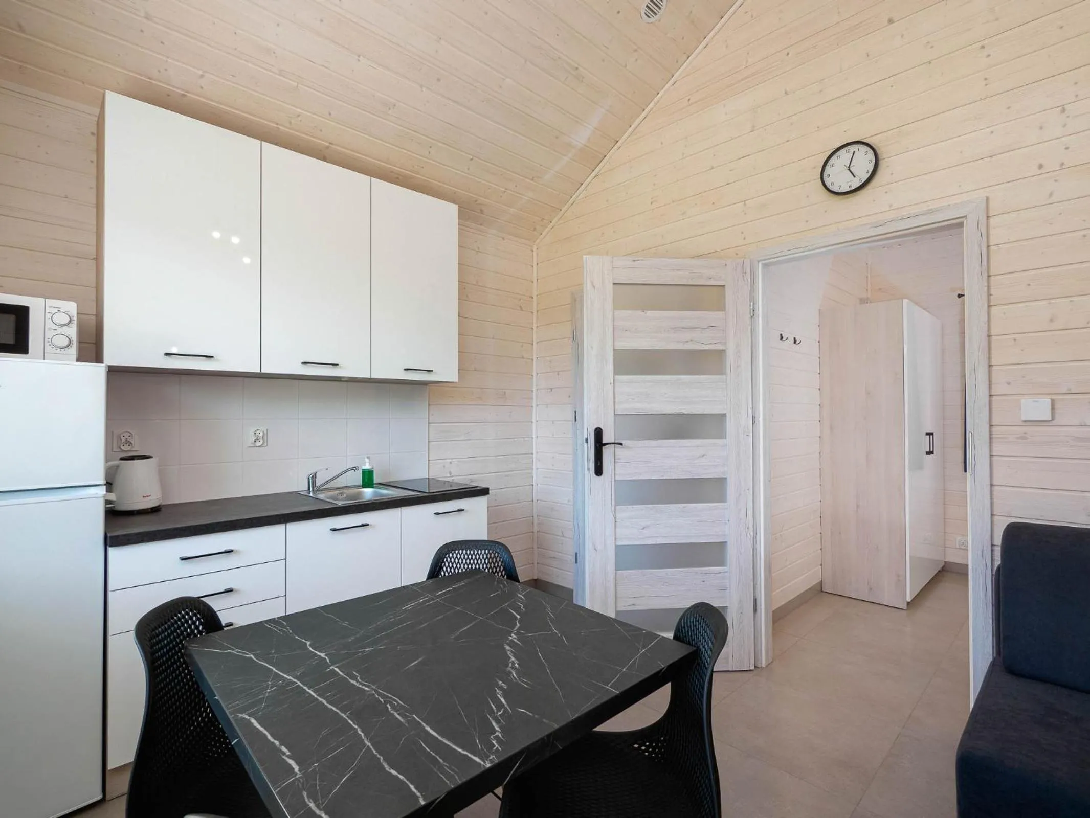 Kitchen or kitchenette in Domki Alan Jarosławiec