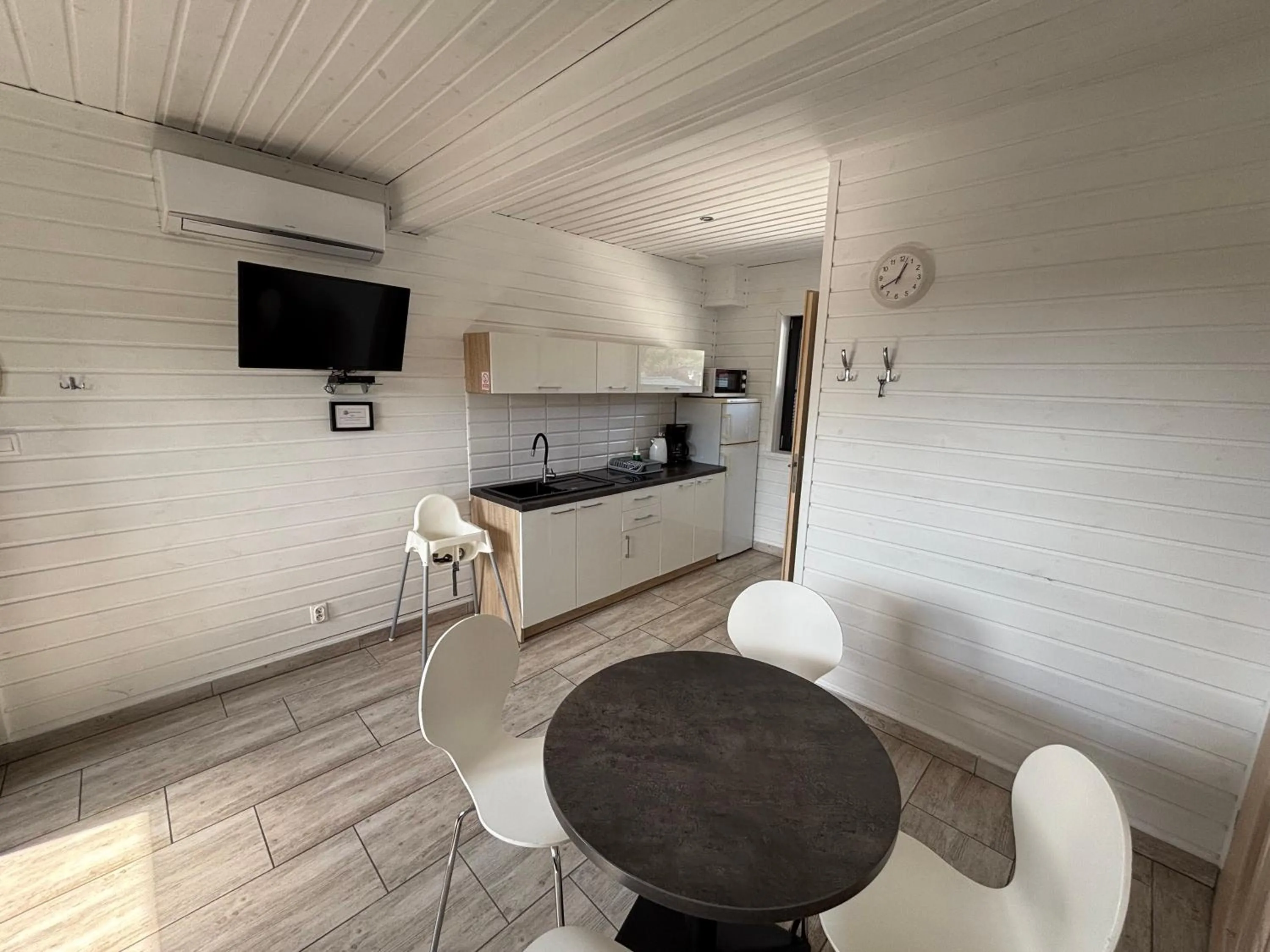 Communal lounge/ TV room in Domki Alan Jarosławiec