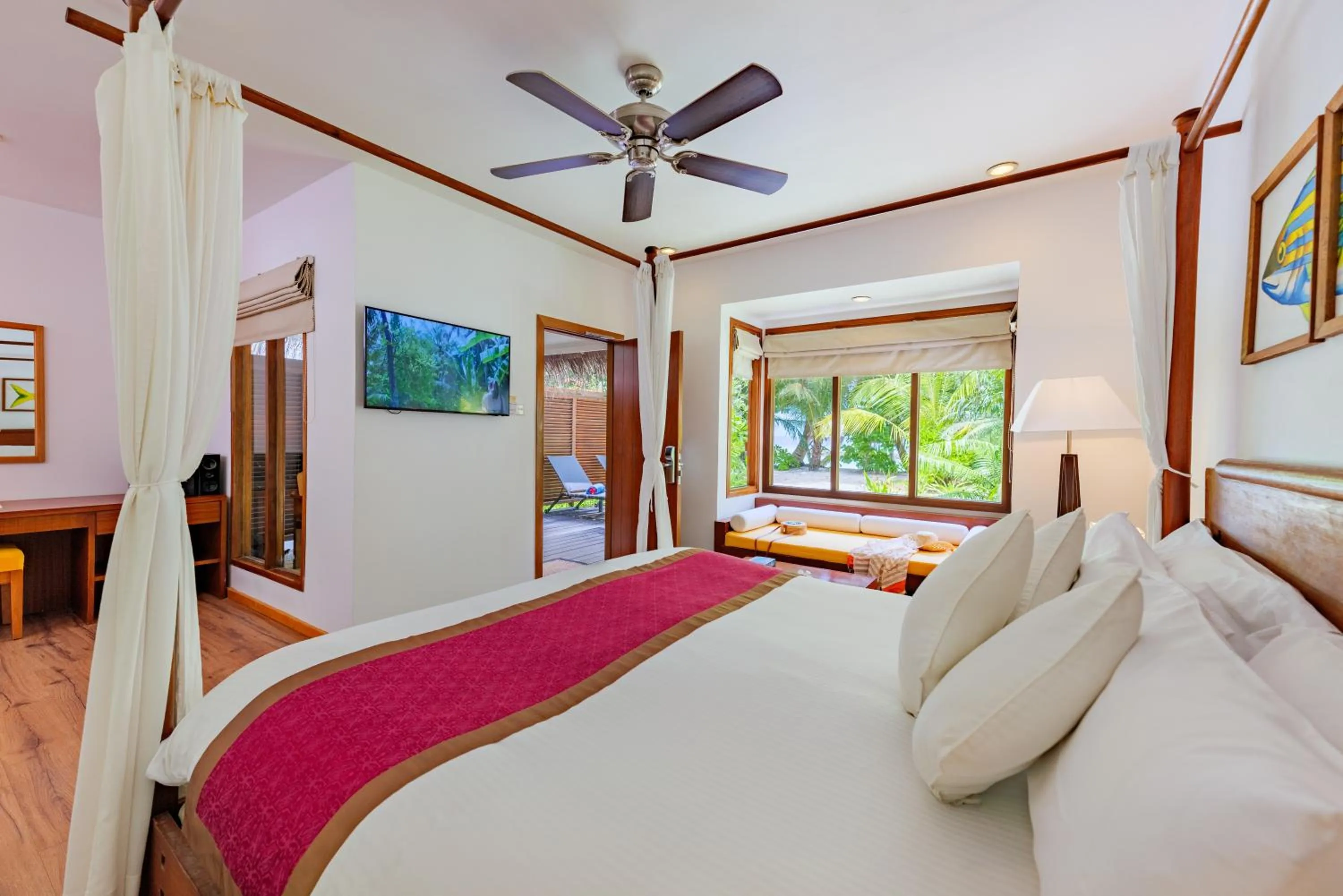 Living room, Bed in Kuramathi Maldives