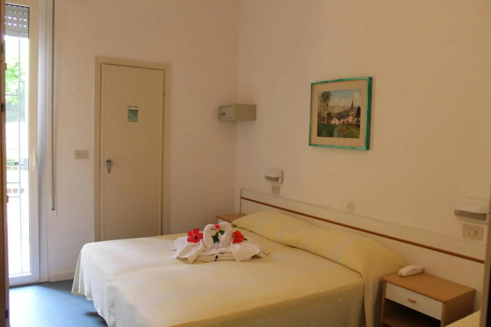 Bed in Hotel Erika