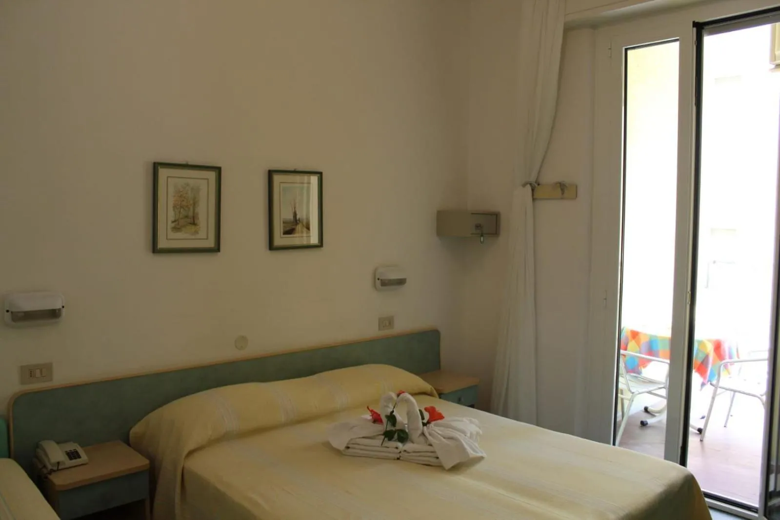 Bed in Hotel Erika