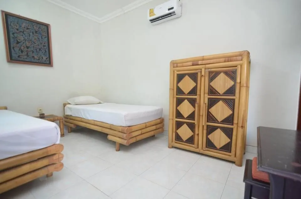 Bed in Puri Itoma Bungalows