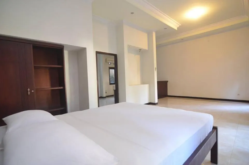 Bed in Puri Itoma Bungalows