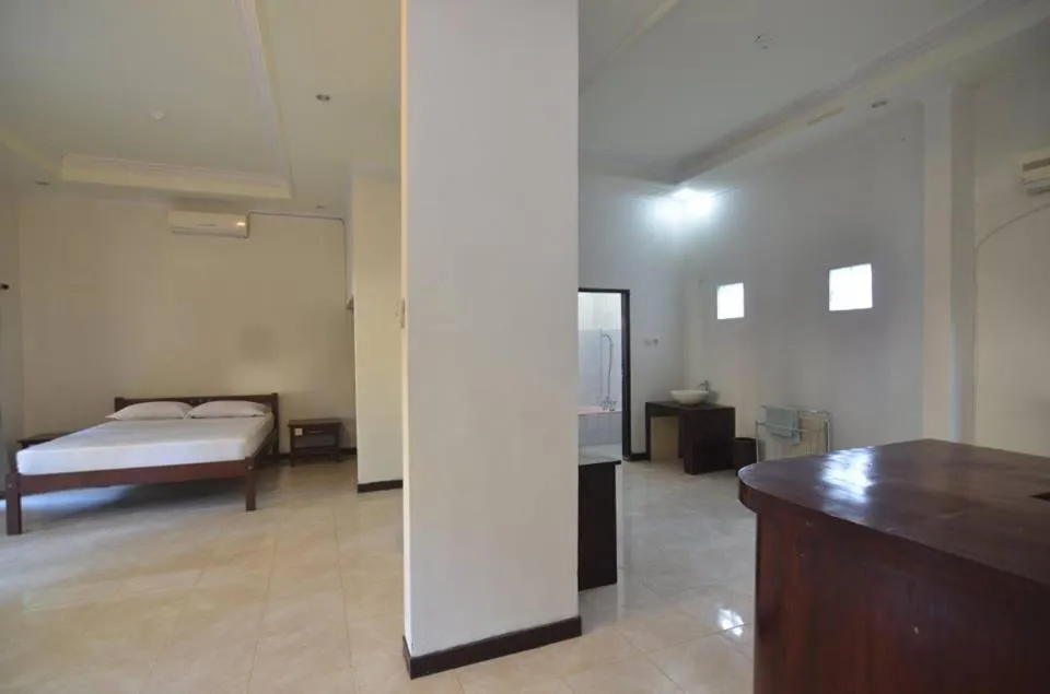 Bed in Puri Itoma Bungalows