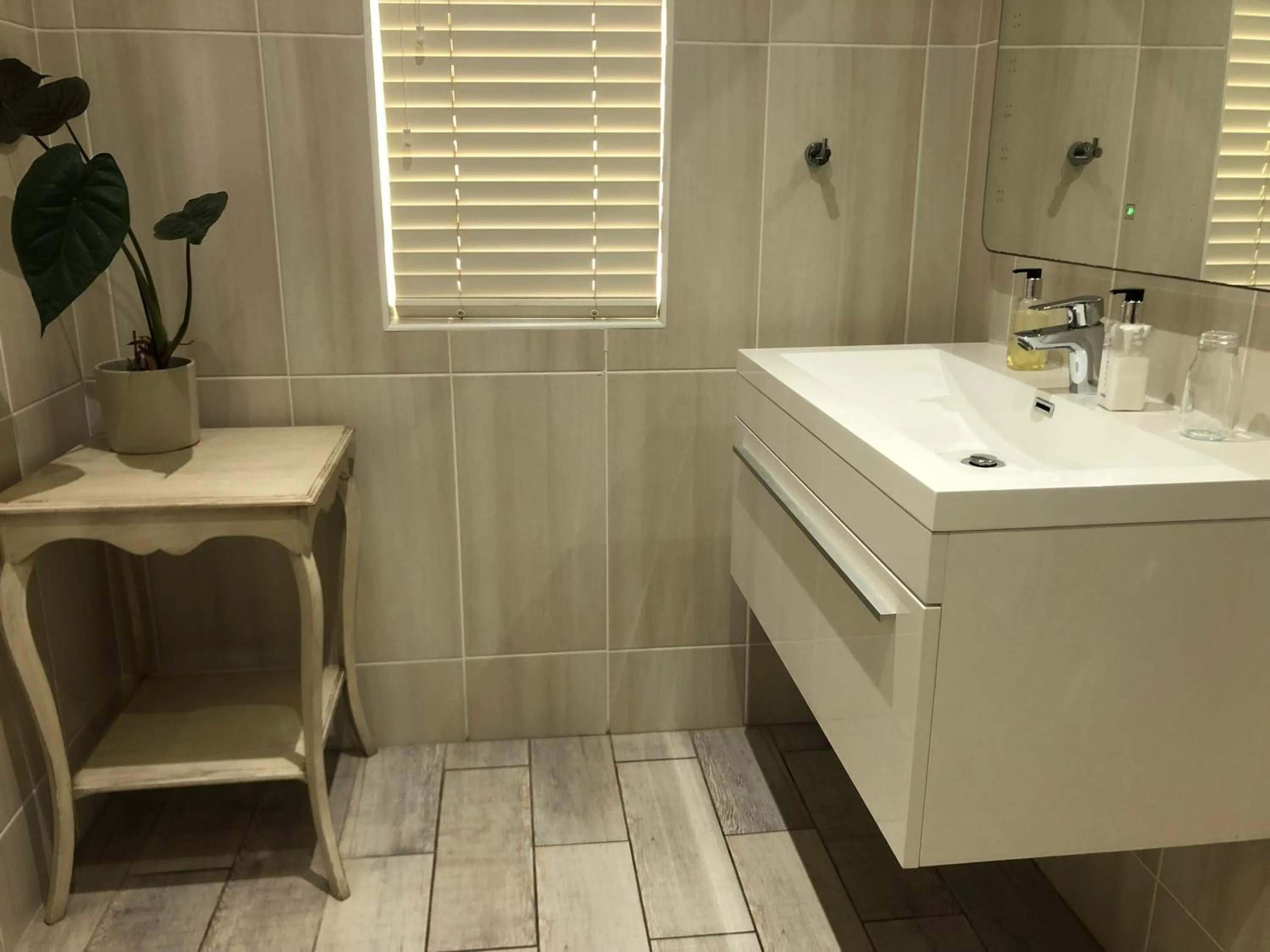 Bathroom in BlueSky Arniston Guest House