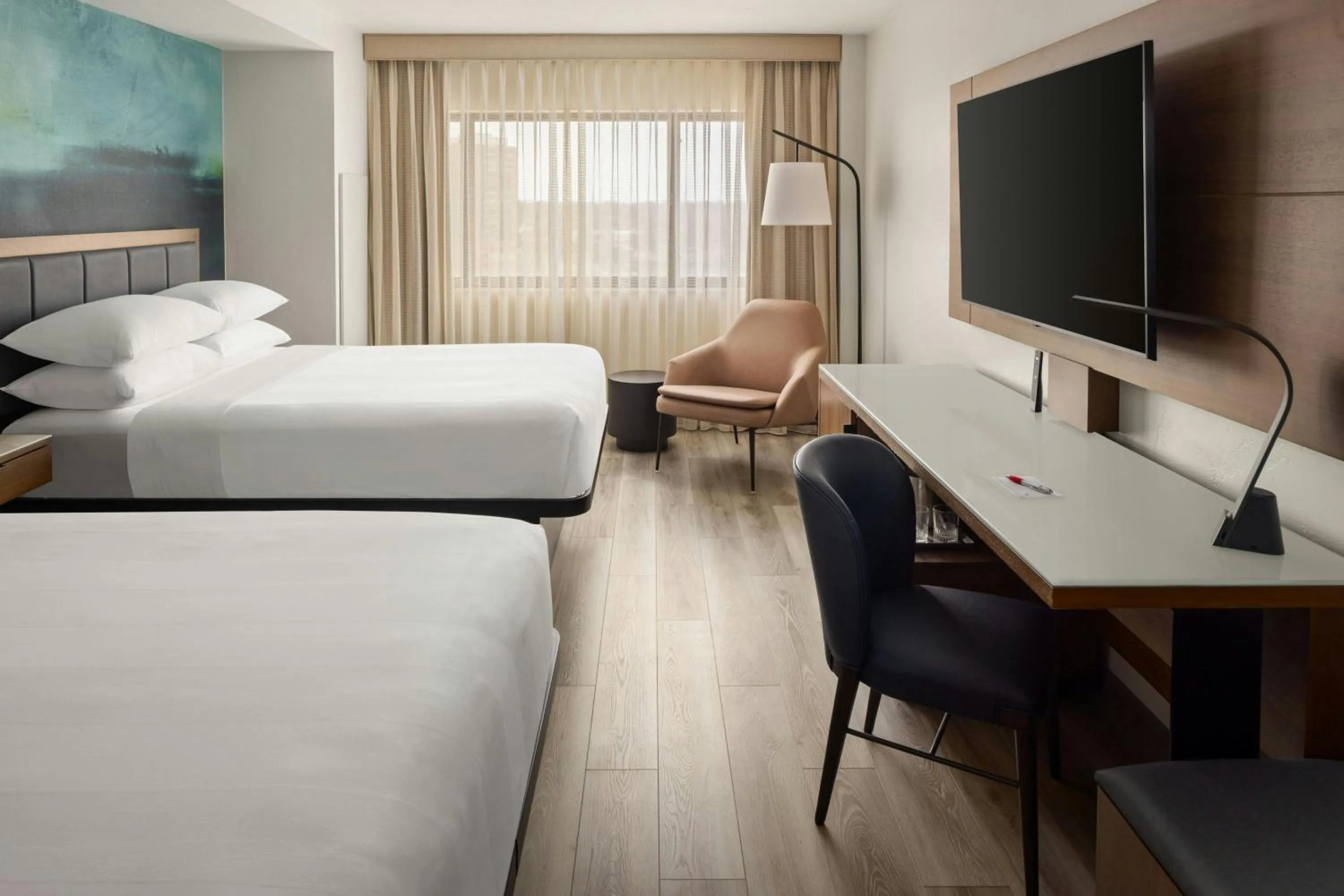 Photo of the whole room, Bed in Oshkosh Marriott Waterfront Hotel & Convention Center