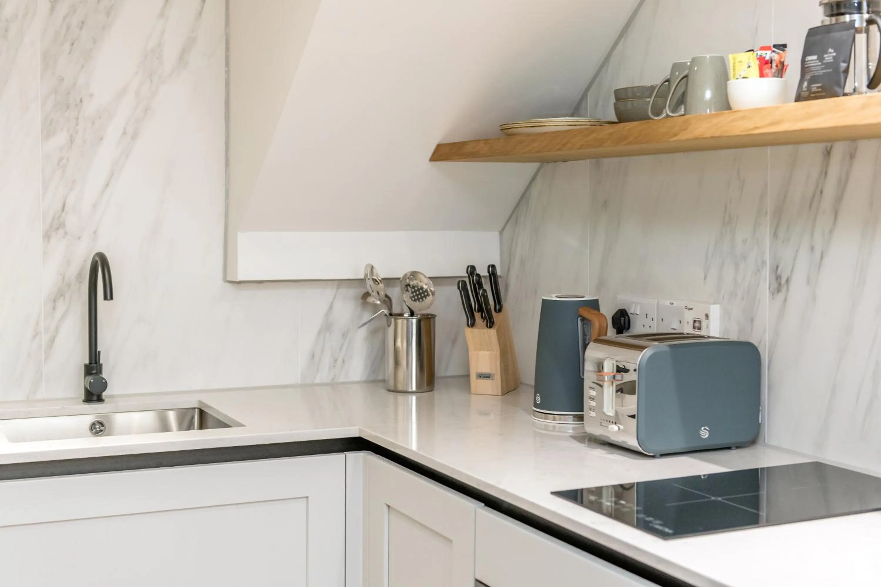 Kitchen or kitchenette in KM Apartments