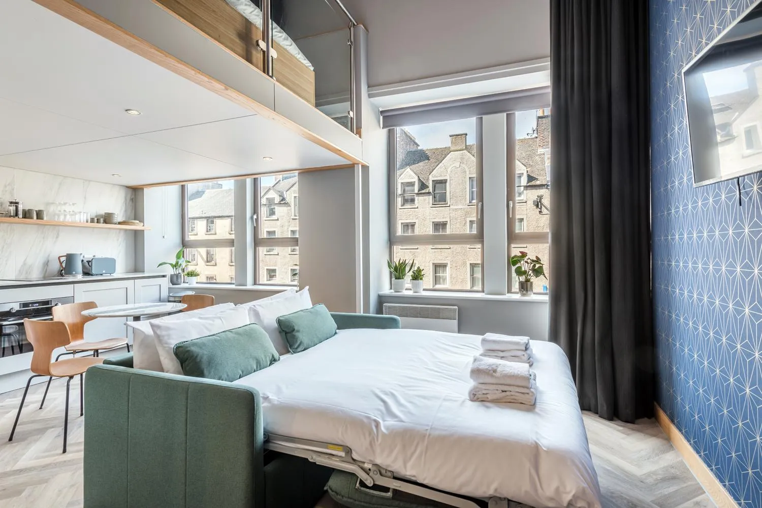 Living room, Bed in KM Apartments