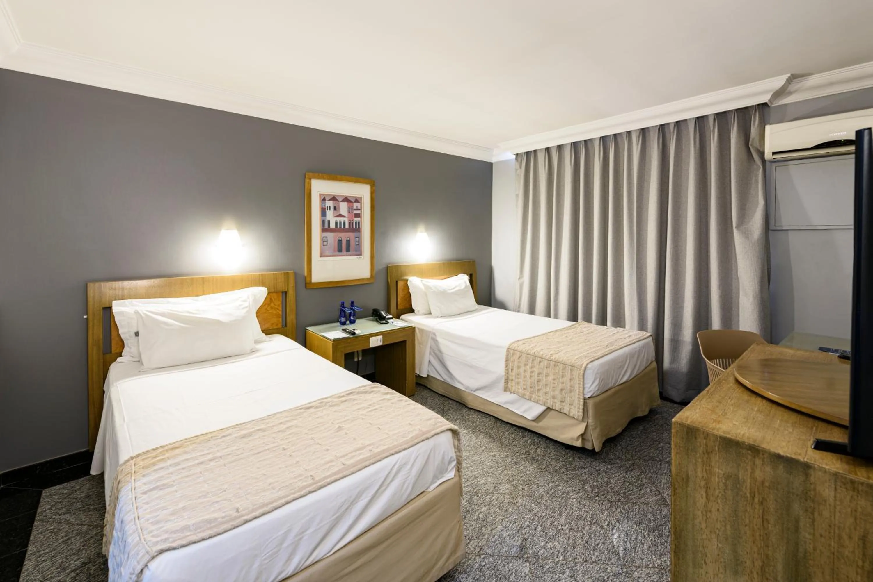 Bed in Plaza Inn Executive