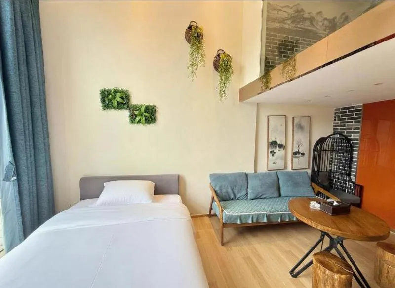 Bed in Yumi Huanju Apartment -广州东站 燕塘地铁站店