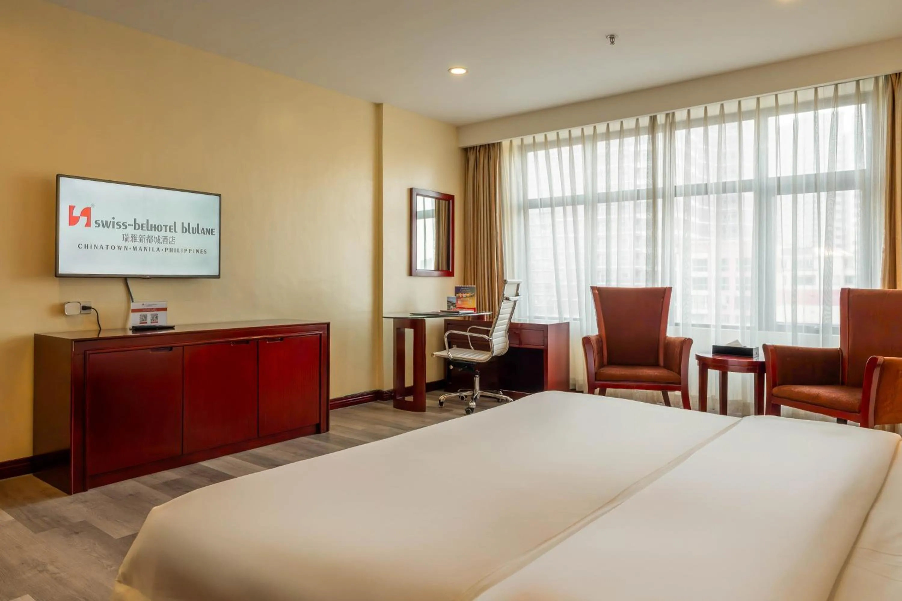 Photo of the whole room, Bed in Swiss-Belhotel Blulane