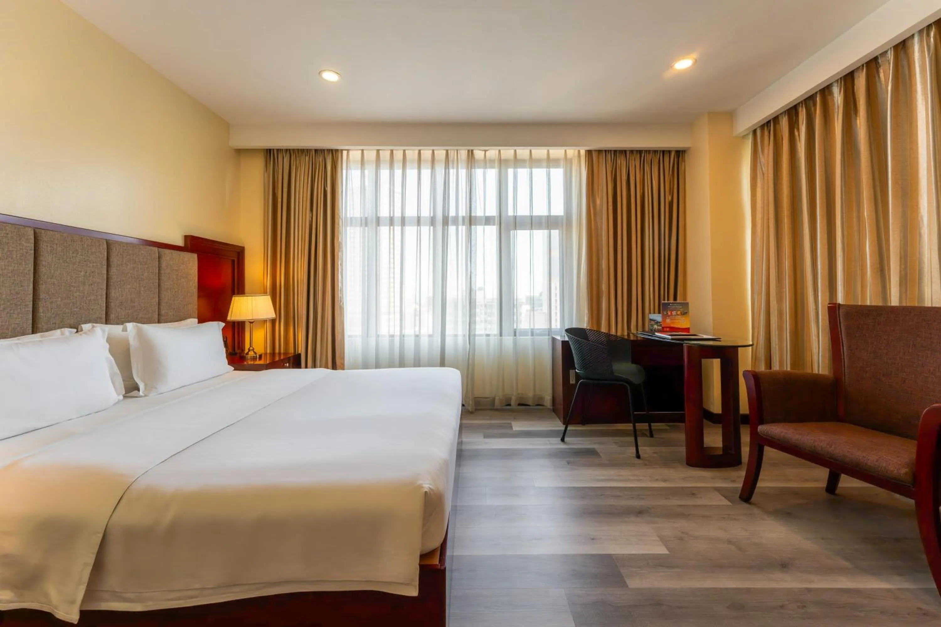 Photo of the whole room, Bed in Swiss-Belhotel Blulane