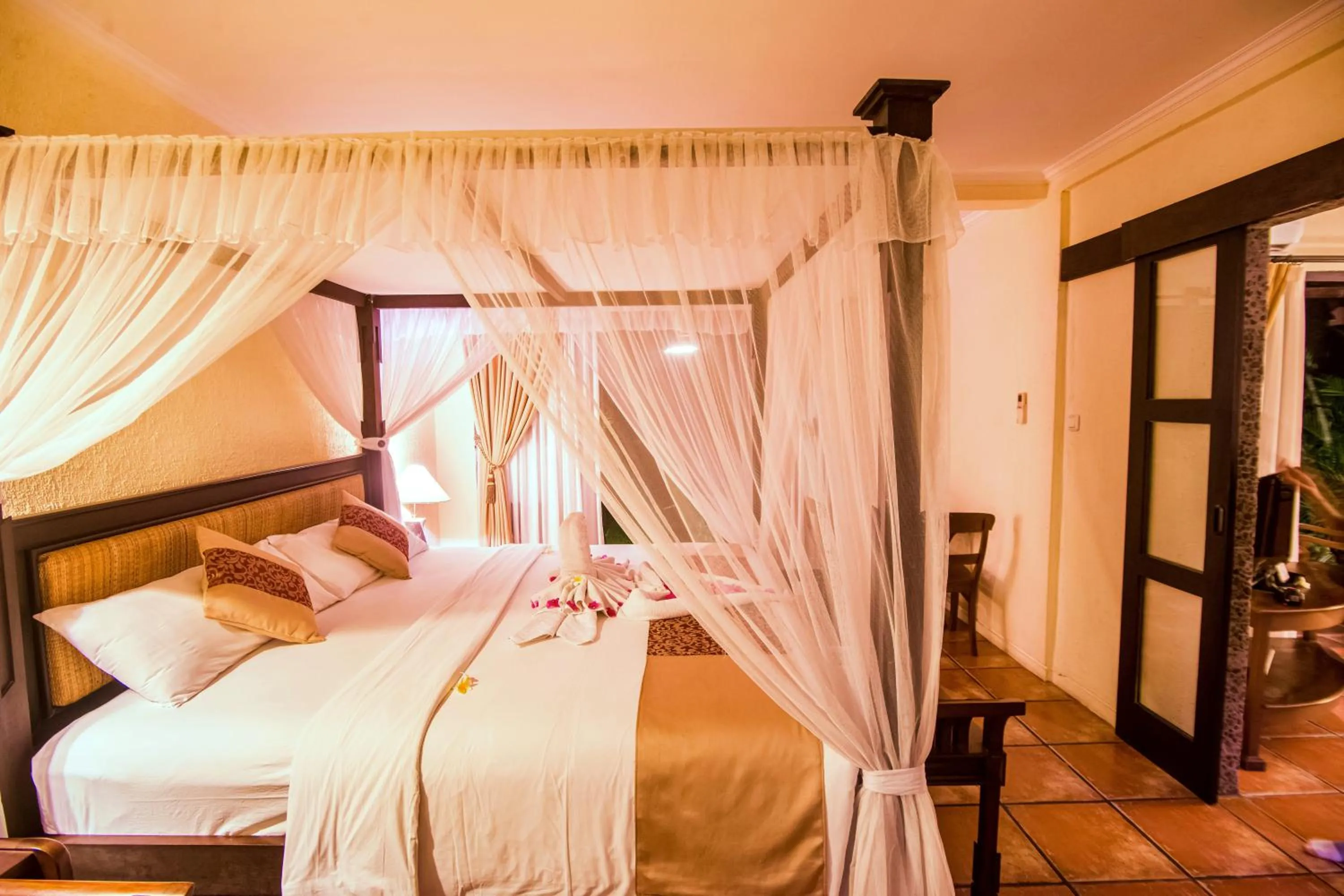 Bed in Nugraha Lovina Seaview Resort & Spa