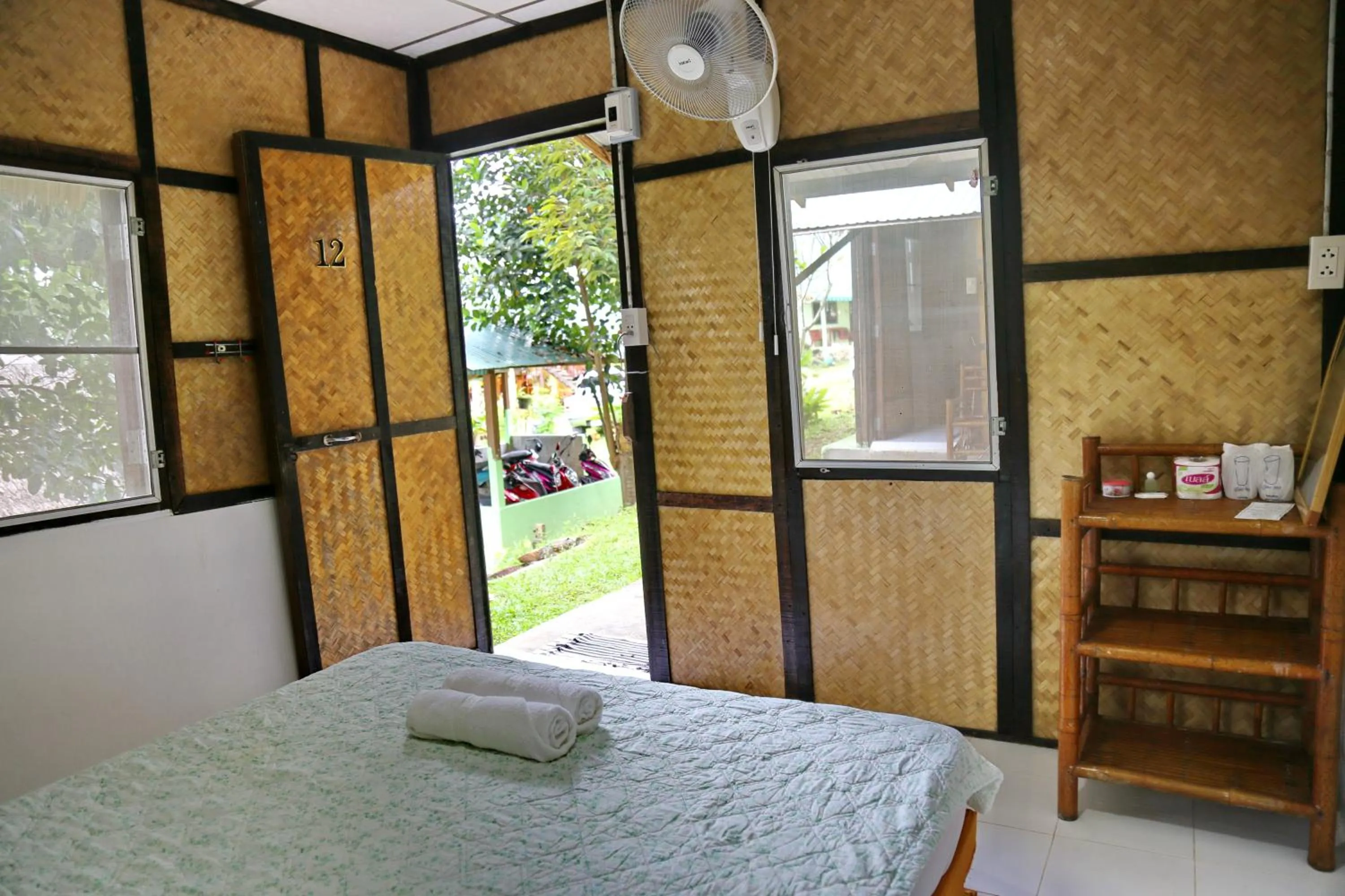 Bed in TP Hut Bungalows
